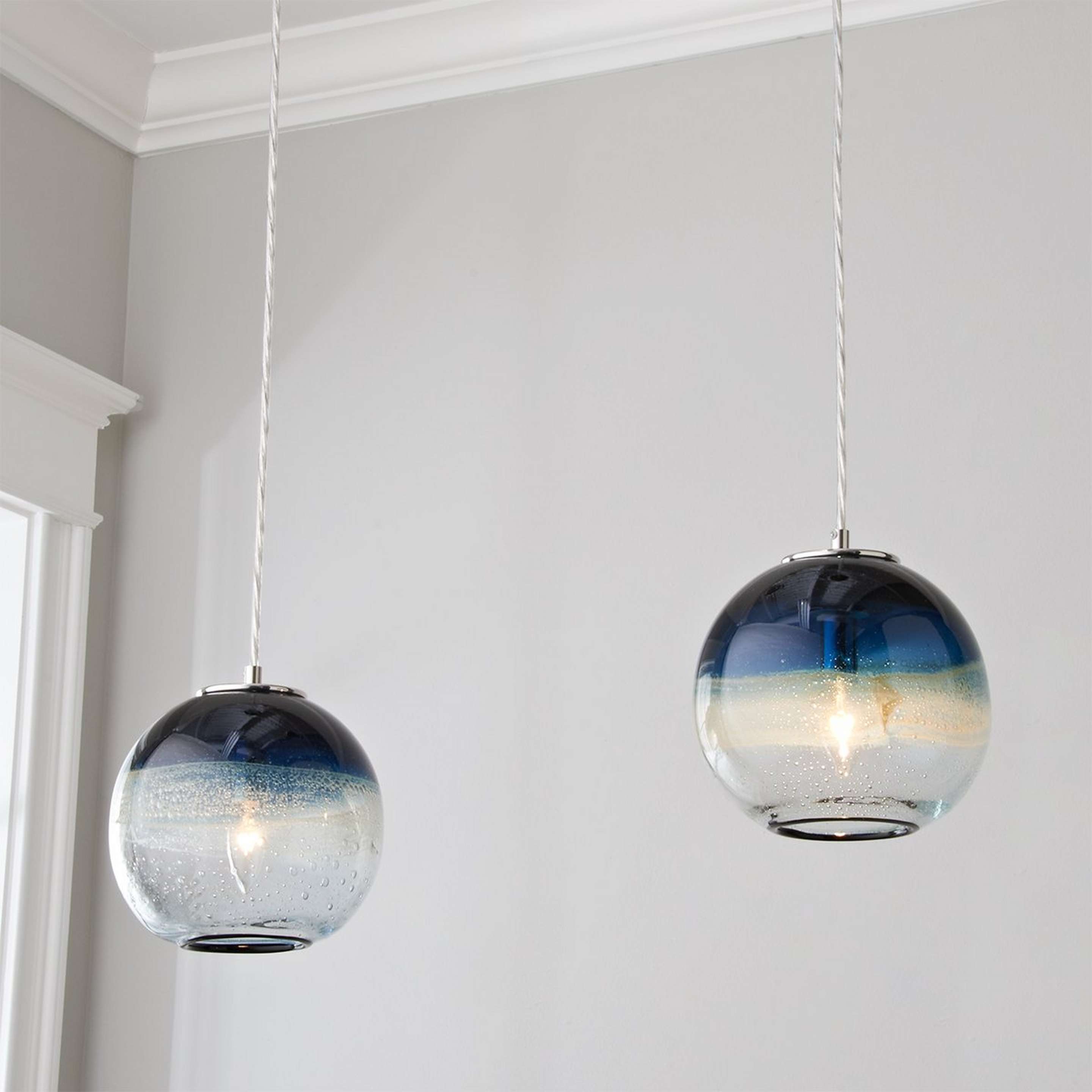 A Sea and Sand Globe Art Glass Pendant with Chrome / Blue / Sand / Seeded Clear color