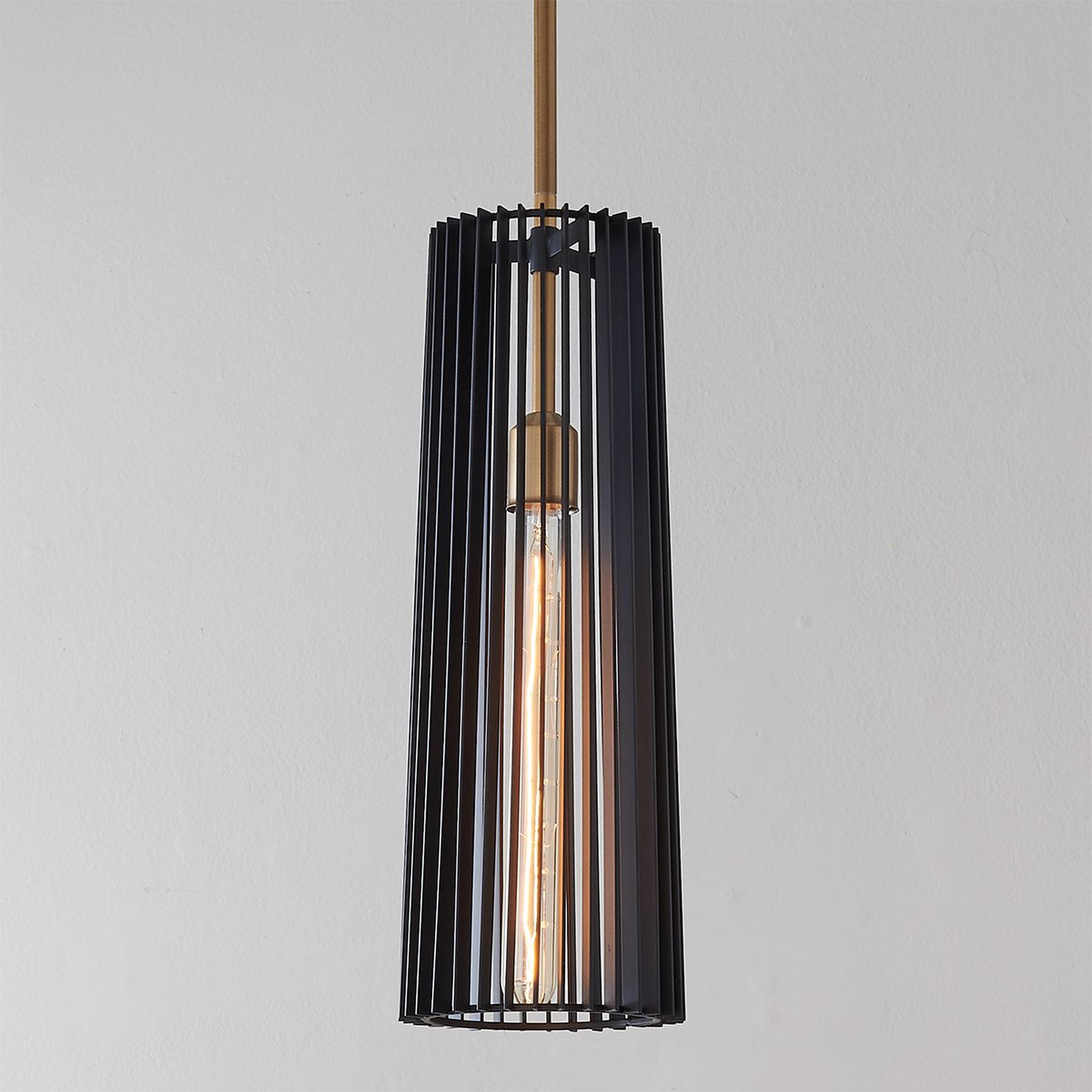 A Concertina Pendant with Brass / Black color