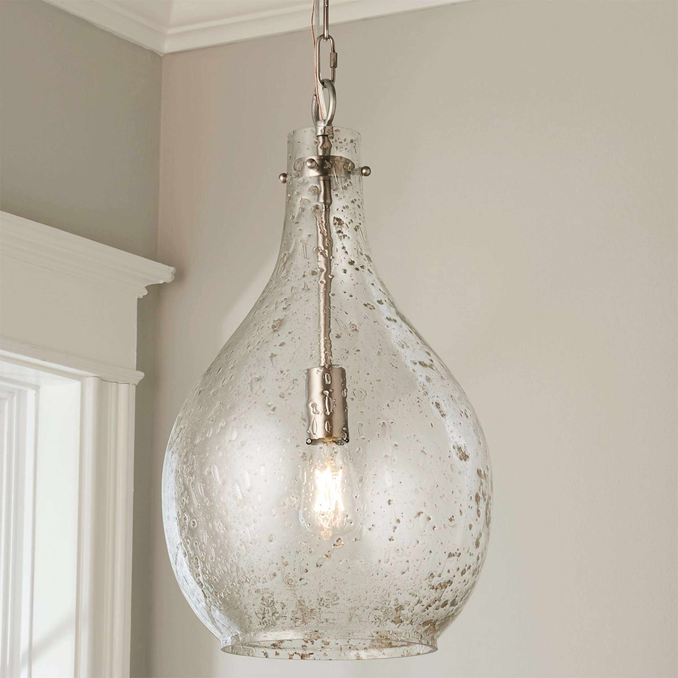 A Seeded Raindrop Pendant with Brushed Nickel color