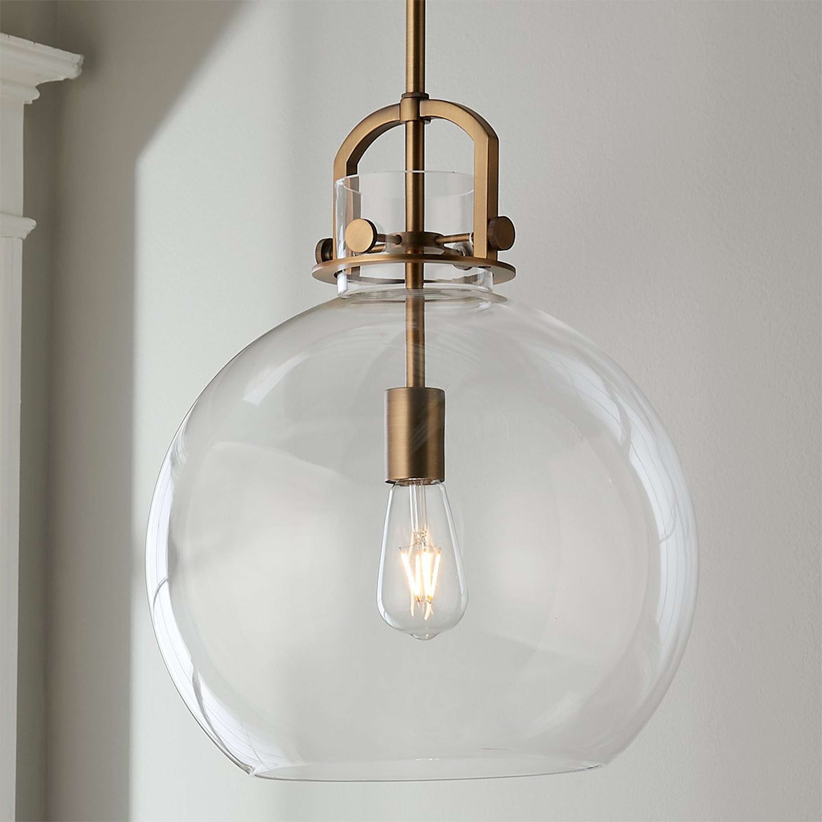 A Urban Planet Pendant - Medium with Brushed Brass / Clear Glass color