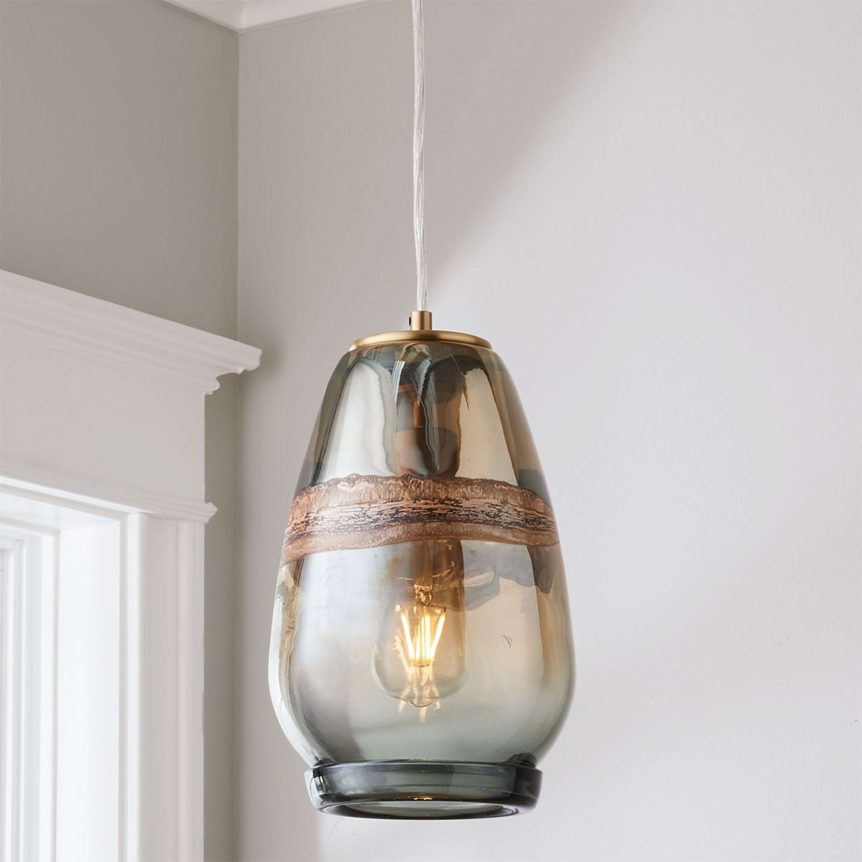 A Seismic Art Glass Pendant with Brass / Smoke / Bronzed color