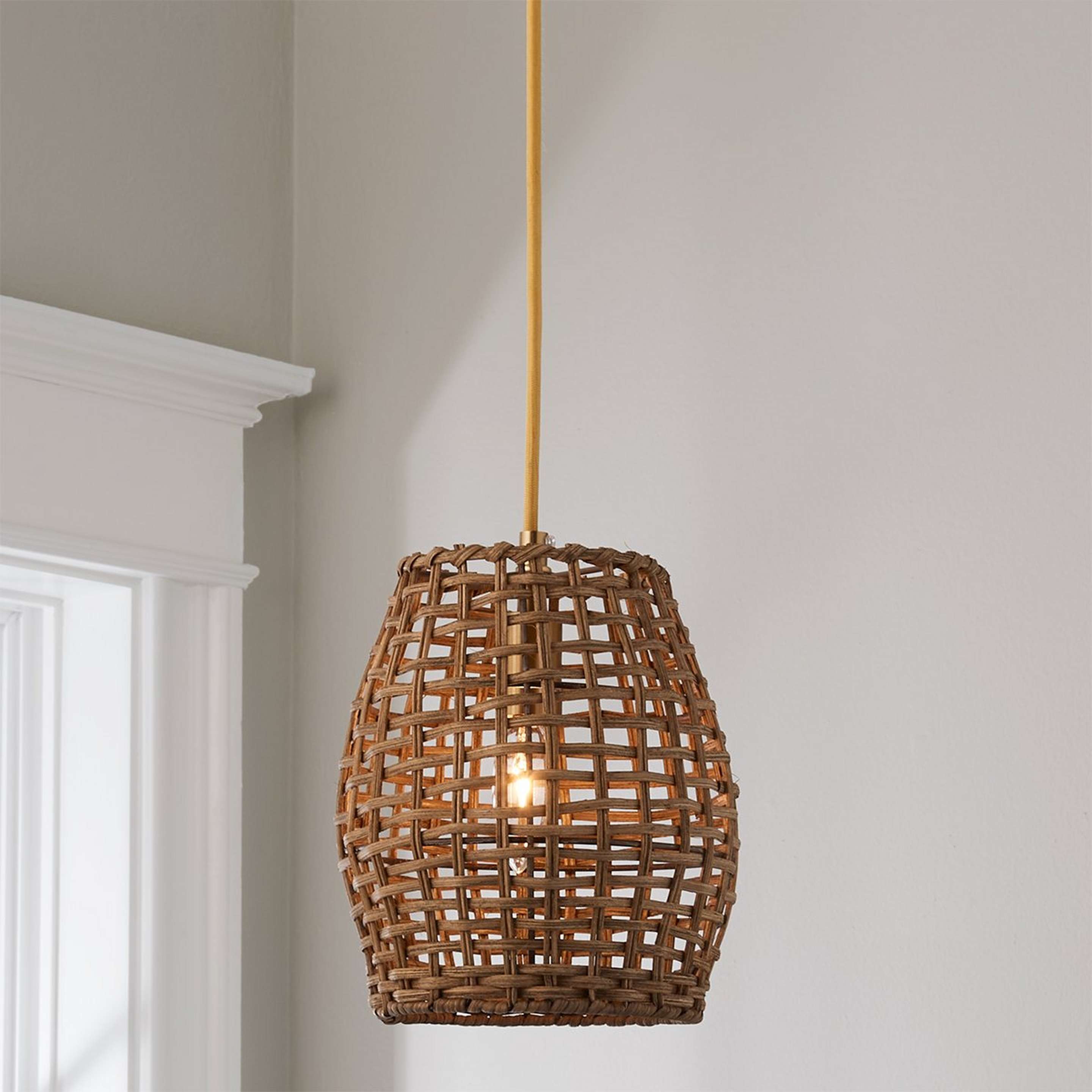 A Young House Love Check Rattan Pendant with Satin Brass / Natural Rattan color