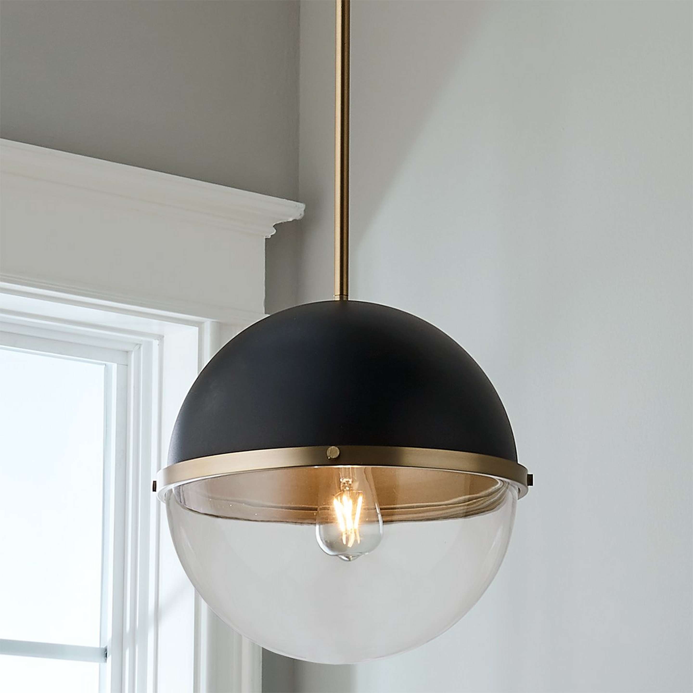 A Reiss Pendant with Aged Brass / Black color