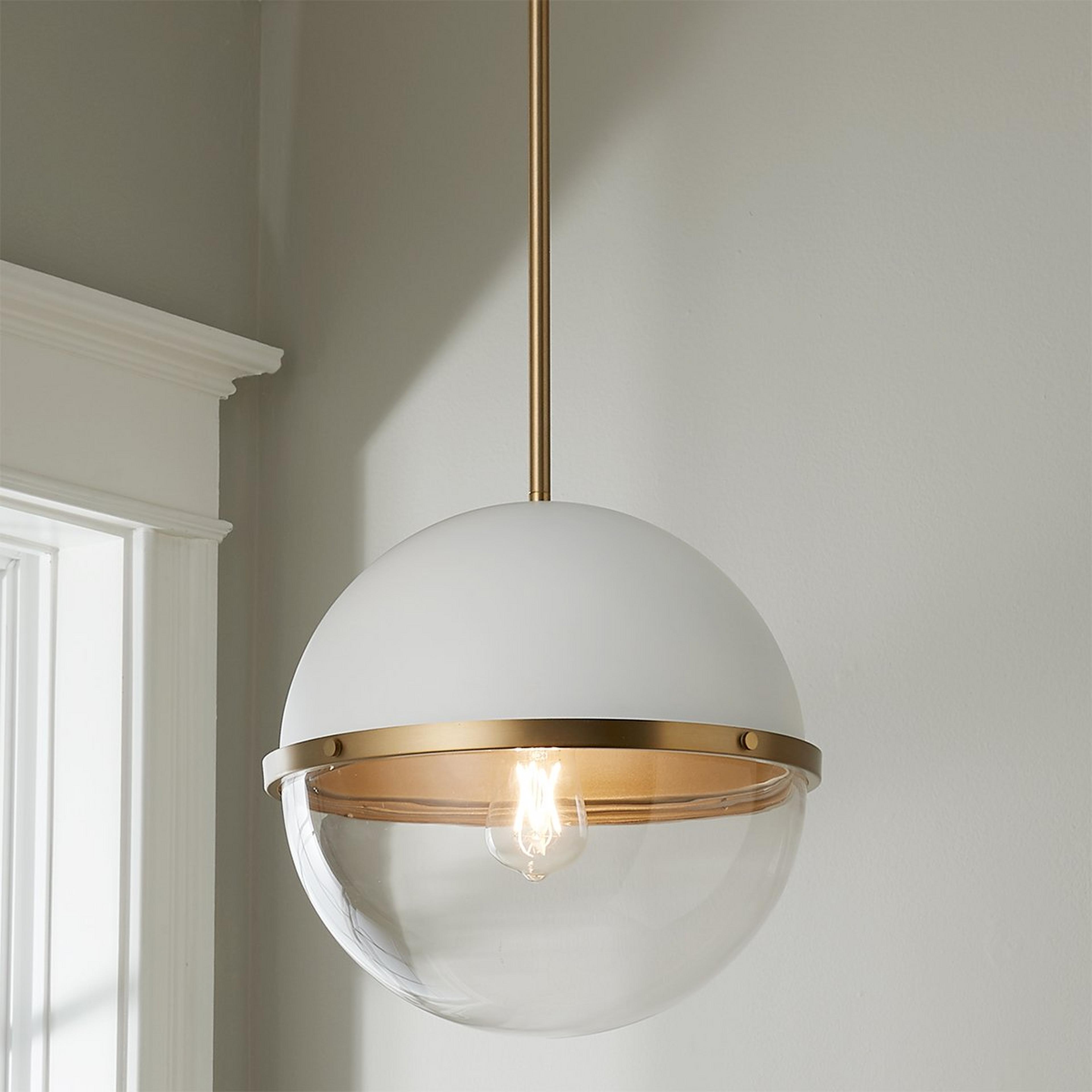 A Reiss Pendant with Aged Brass / White color