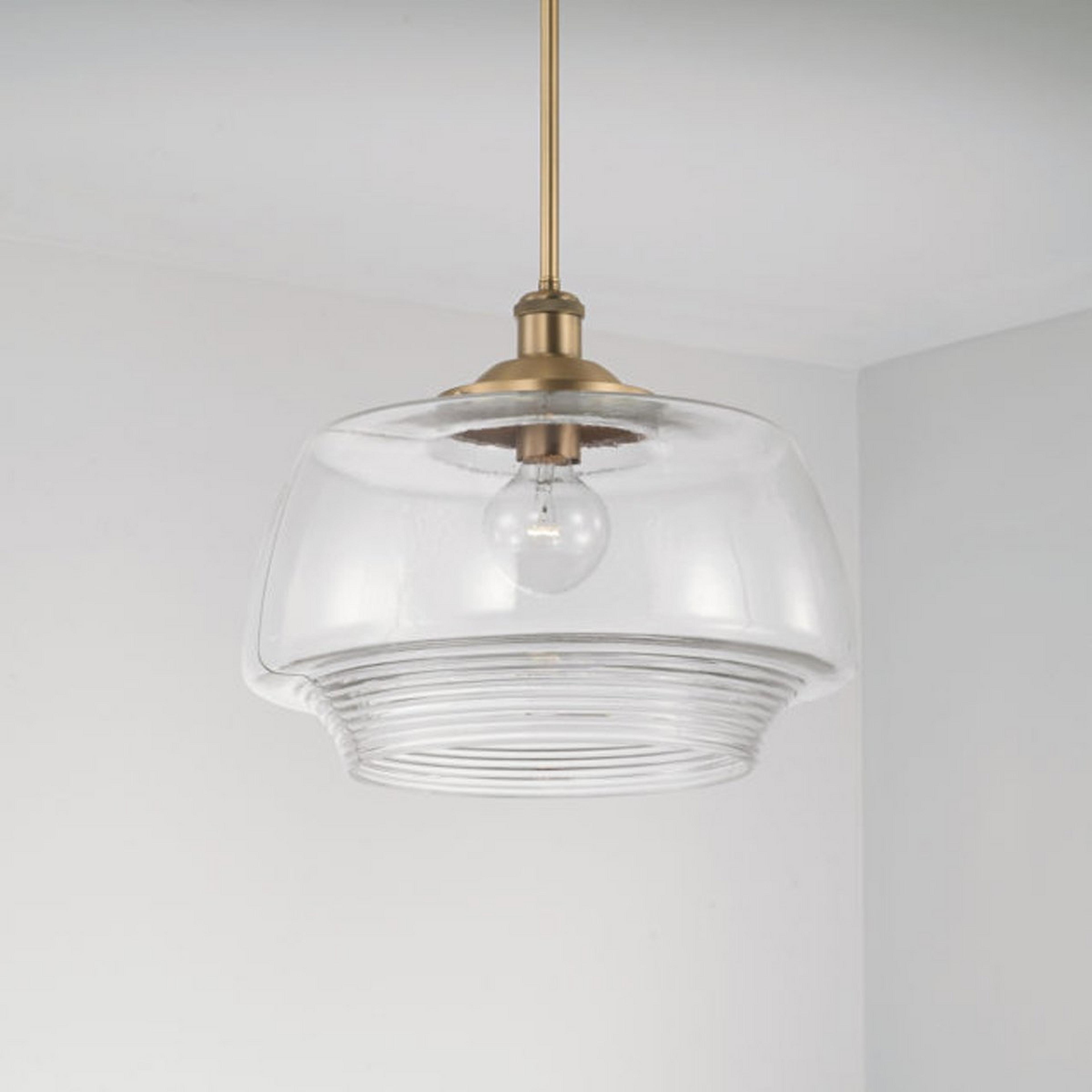 A Eli Pendant with Aged Brass / Clear Glass color