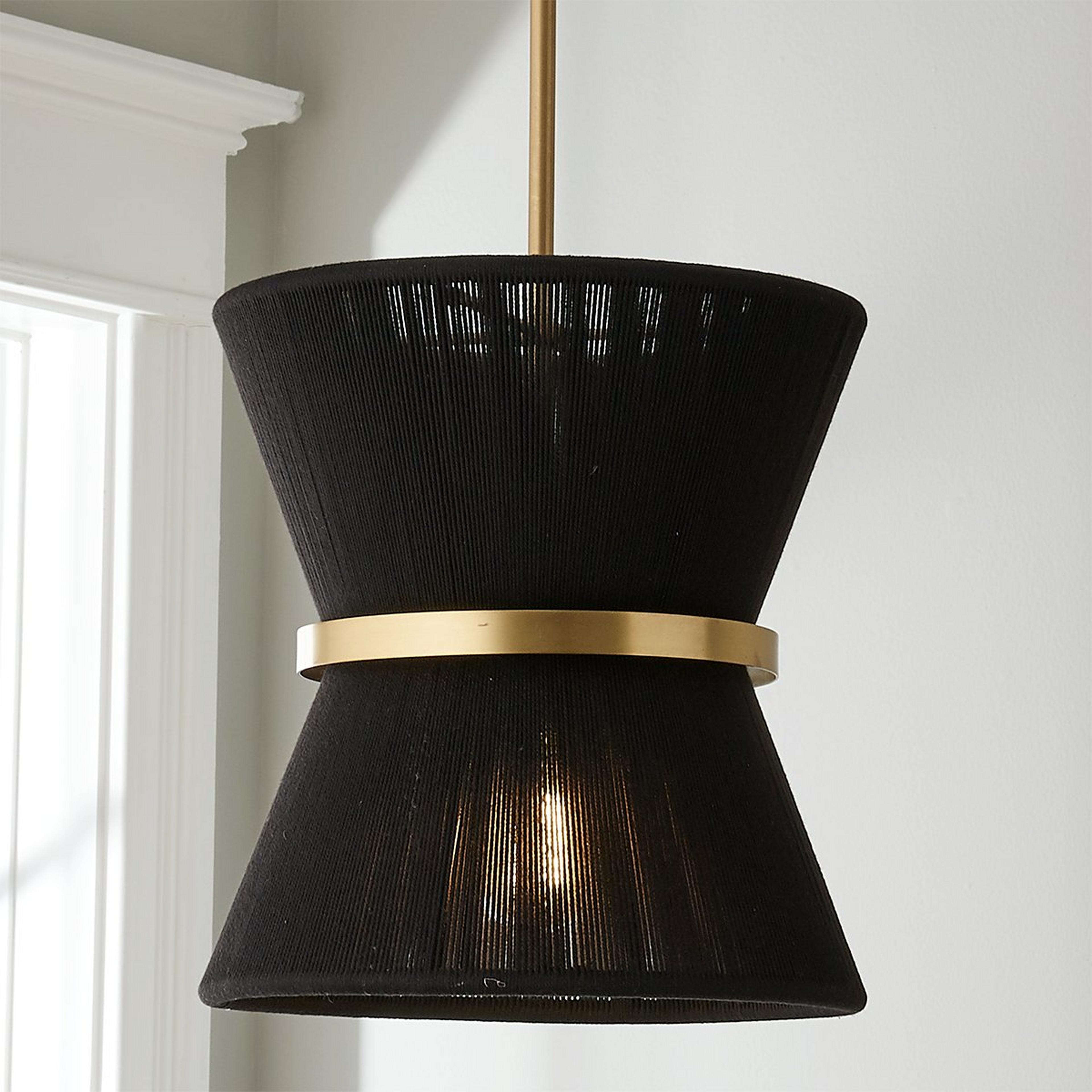 A Halia Pendant with Brass / Black Rope color