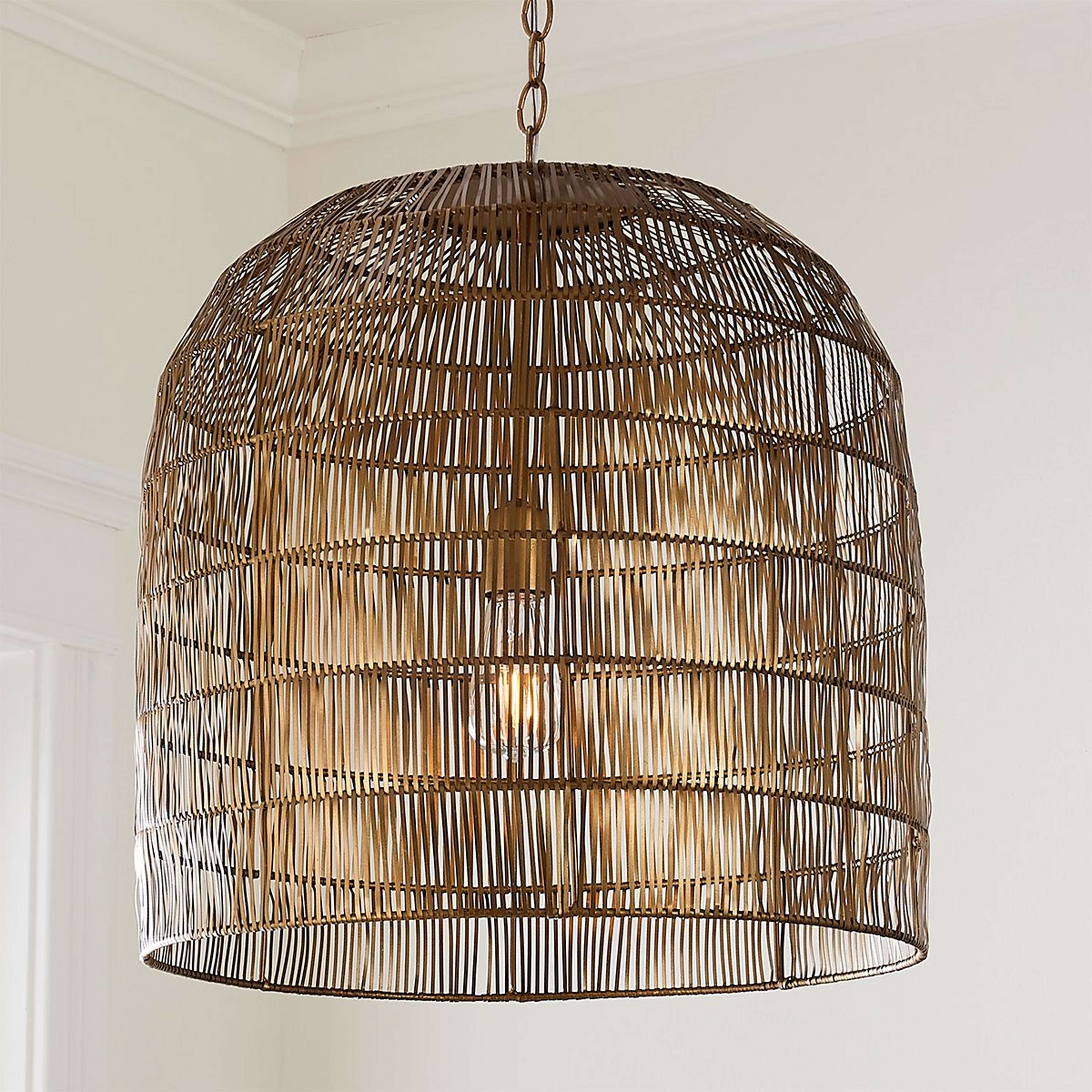 A Sculpted Cage Pendant with Aged Brass color