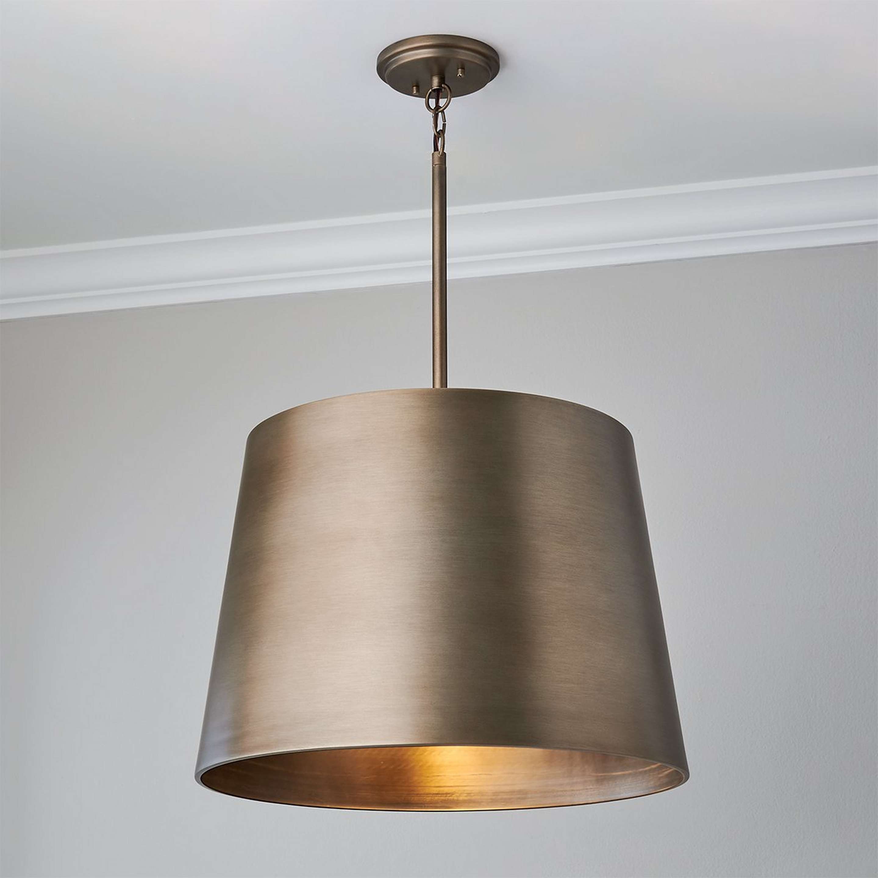A Saresh Indoor / Outdoor Drum Pendant with Burnished Bronze color