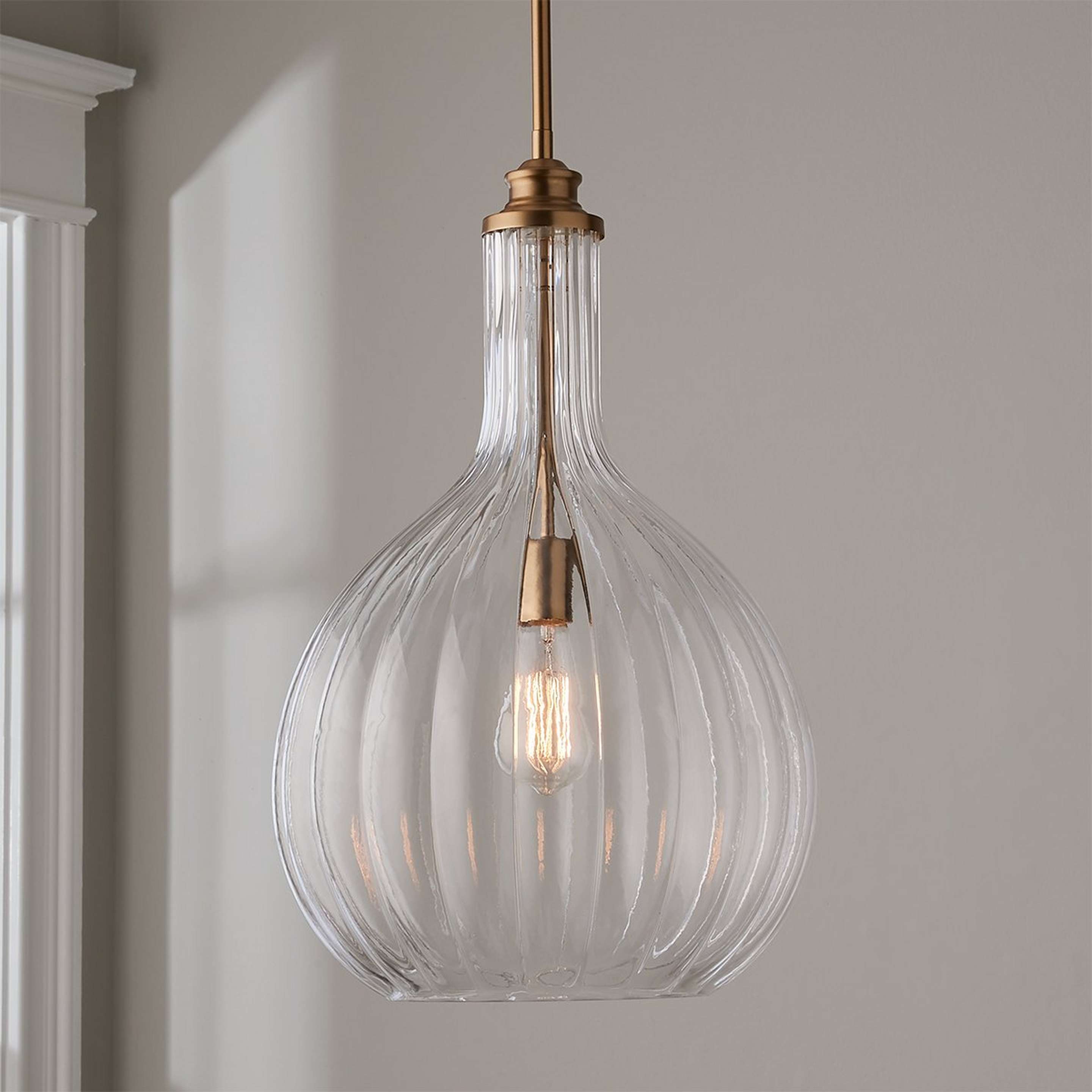 A Fluted Globe Pendant with Aged Brass / Clear Glass color