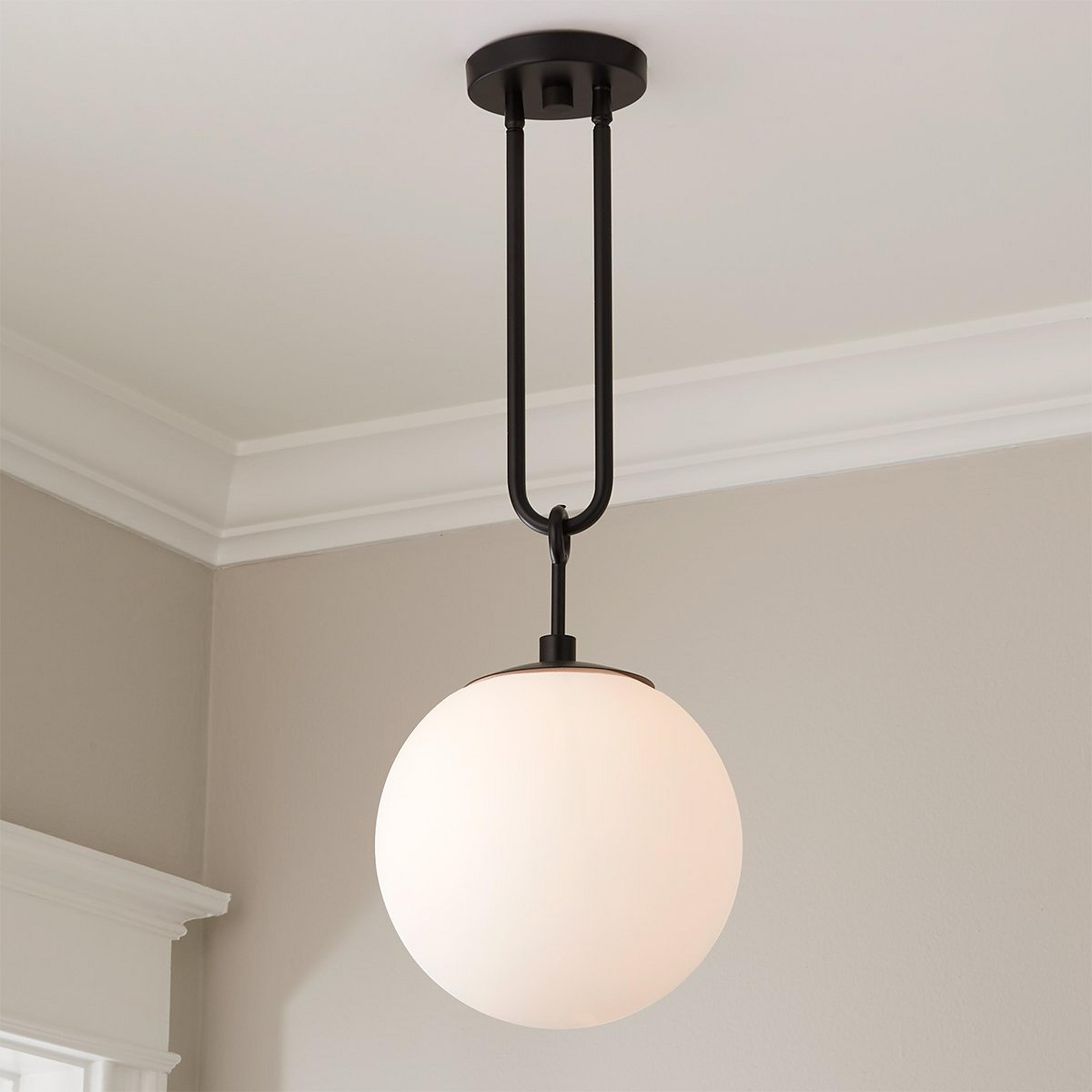 A Milky Globe Drop Pendant with Matte Black / Milk Glass color