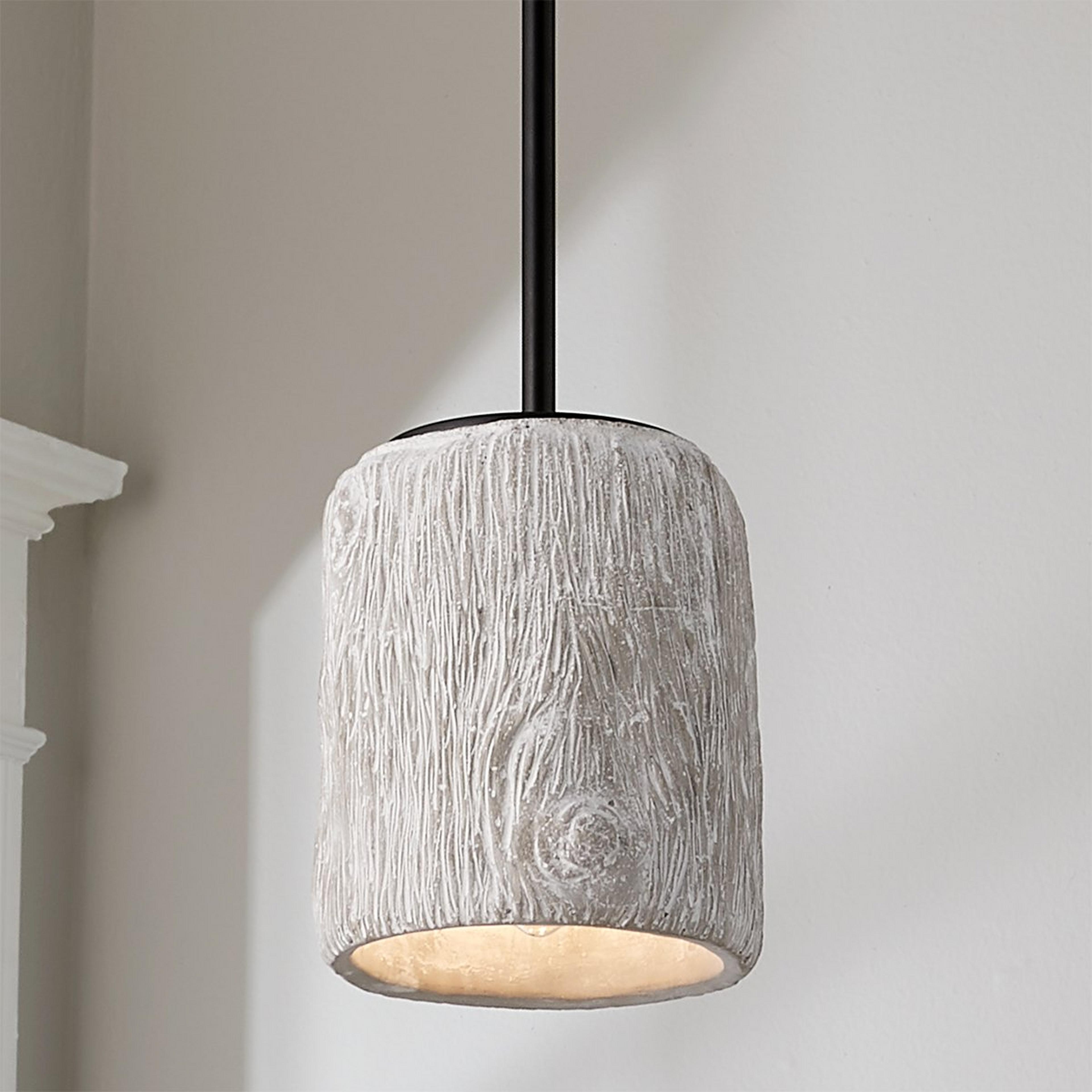 A Textured wood pendant with Black / White Washed Cement color