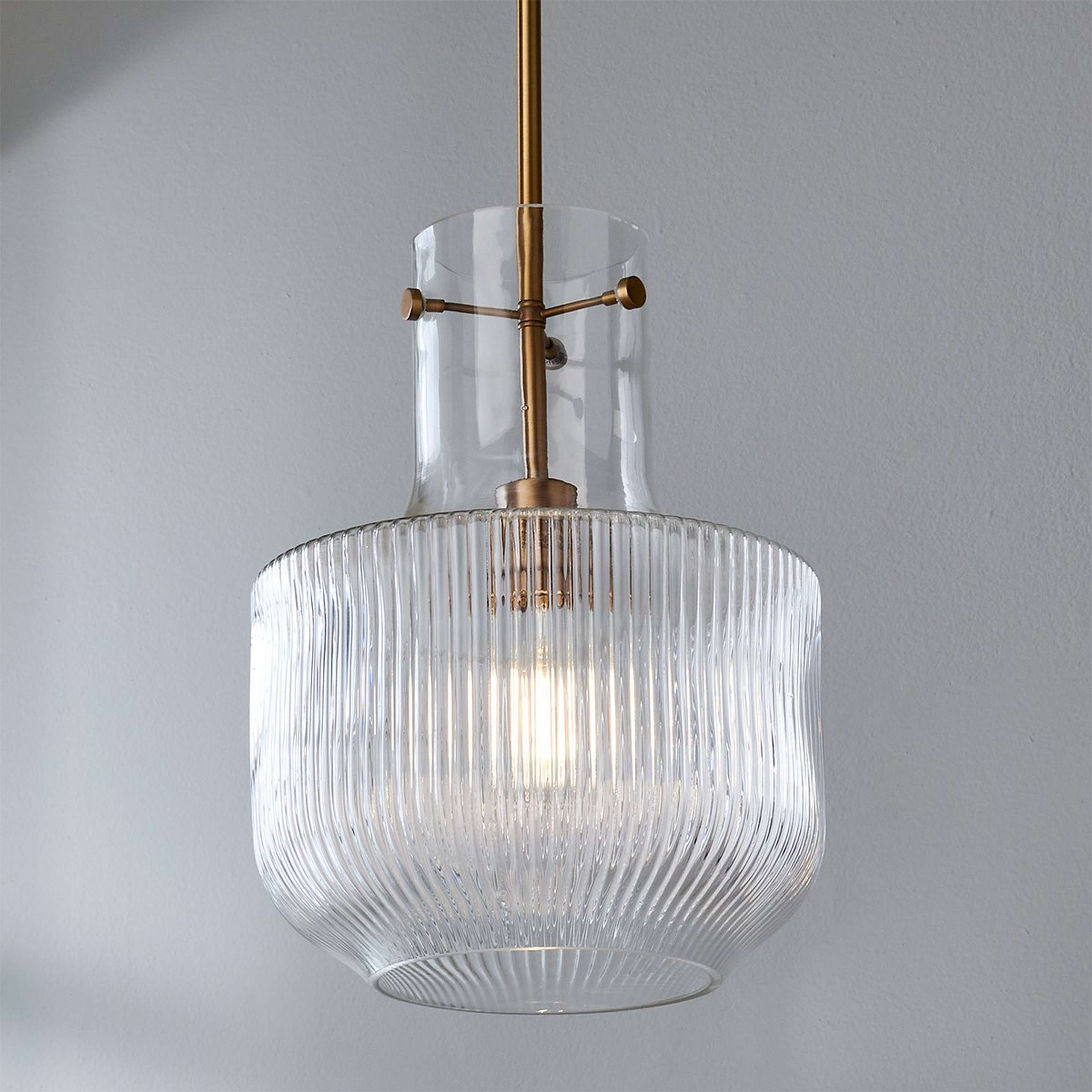 A Fluted Tulip Pendant with Aged Brass / Clear Ribbed Glass color