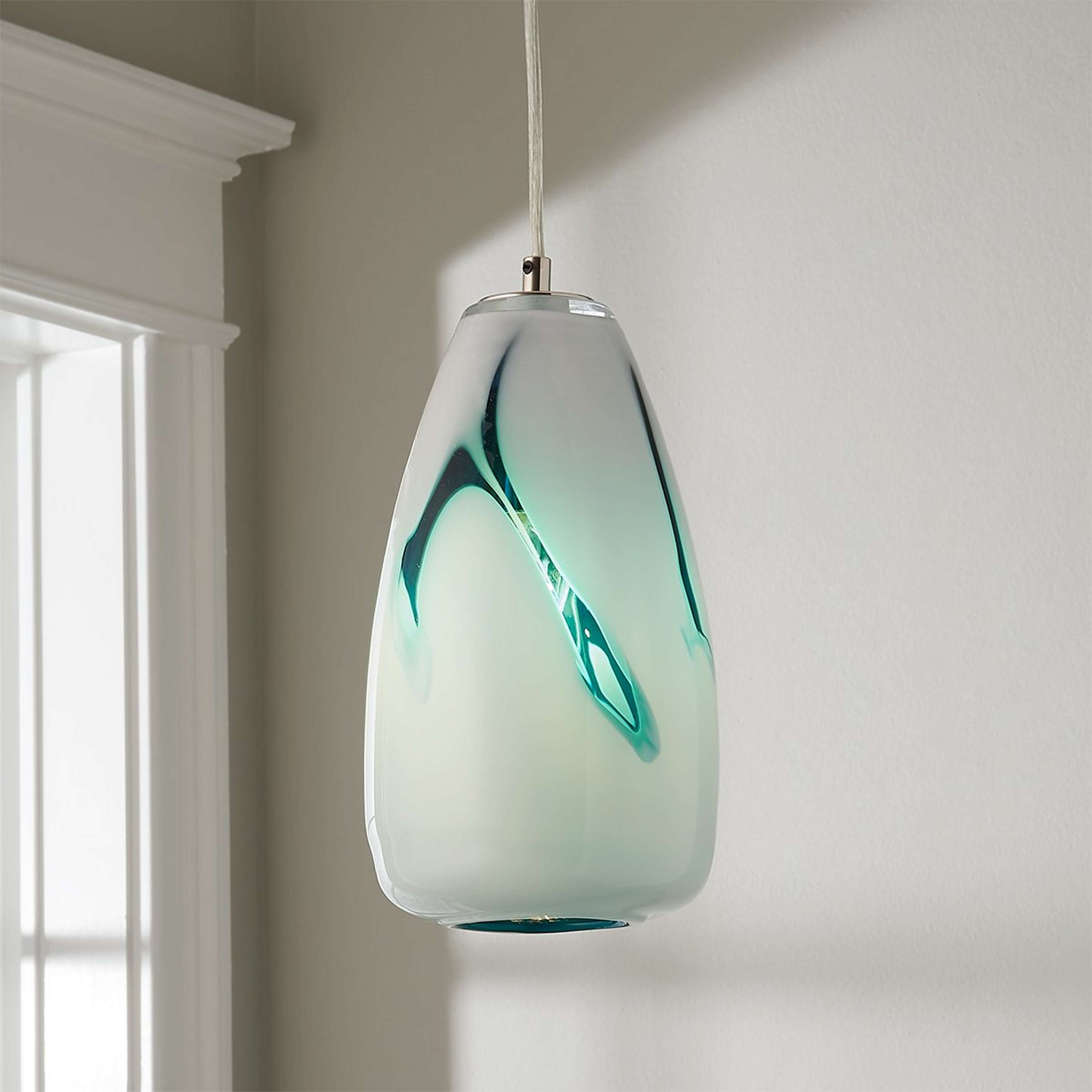 A Lucia Swirl Pendant with Polished Nickel / White / Cyan color