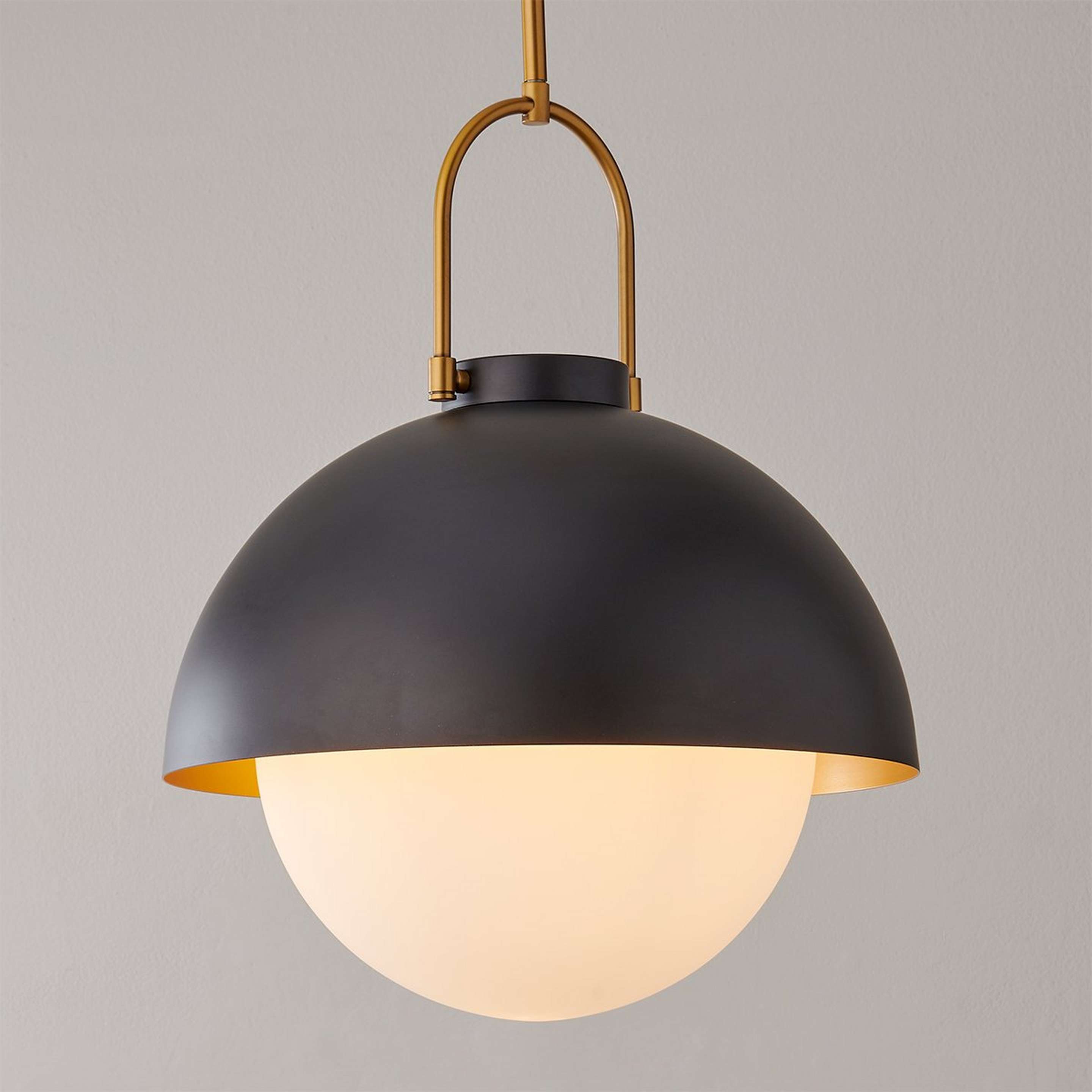 A Mabry Dome Pendant with Matte Black / Gold / Opal Glass color