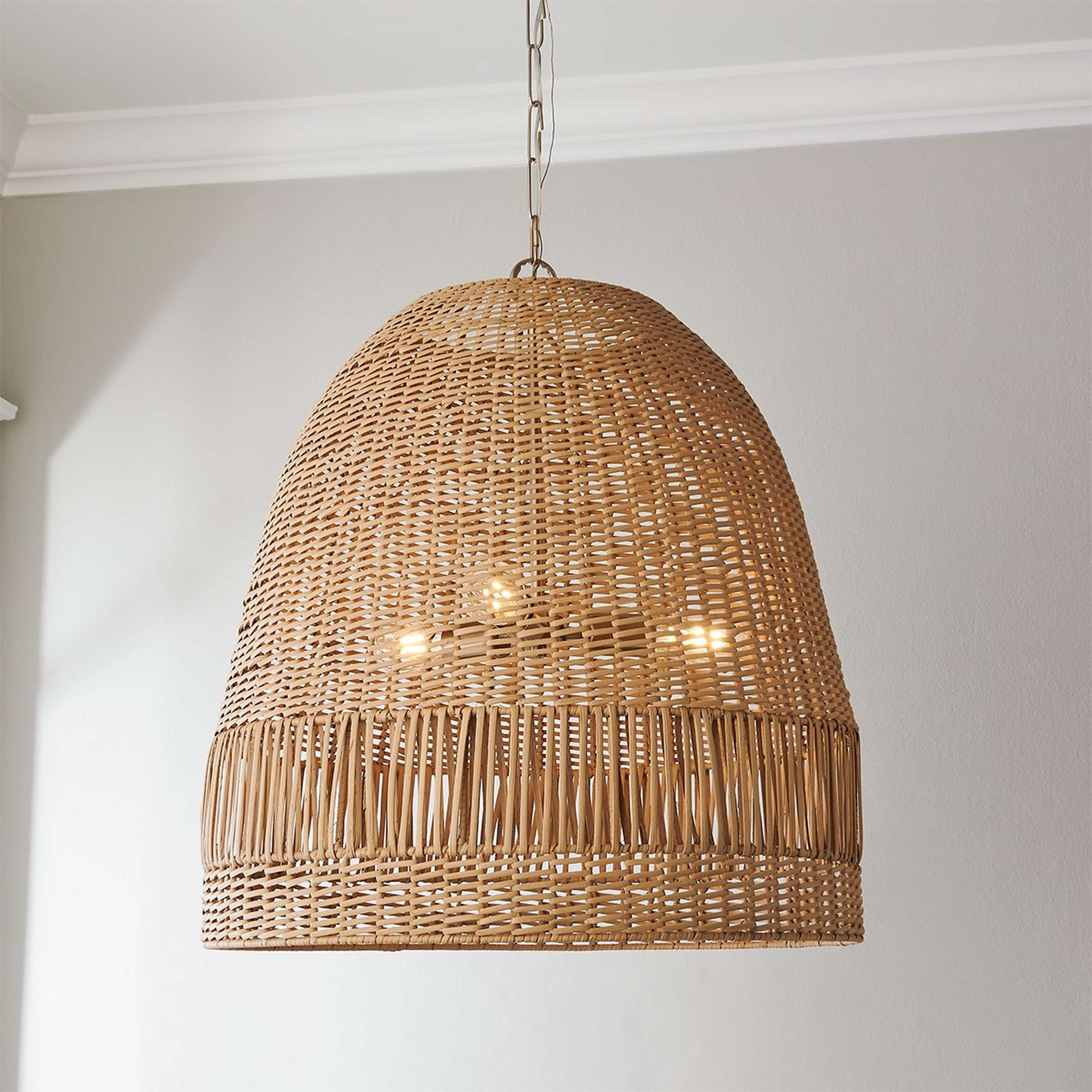 A Channel Side Chandelier with Matte Brass / Natural Rattan color