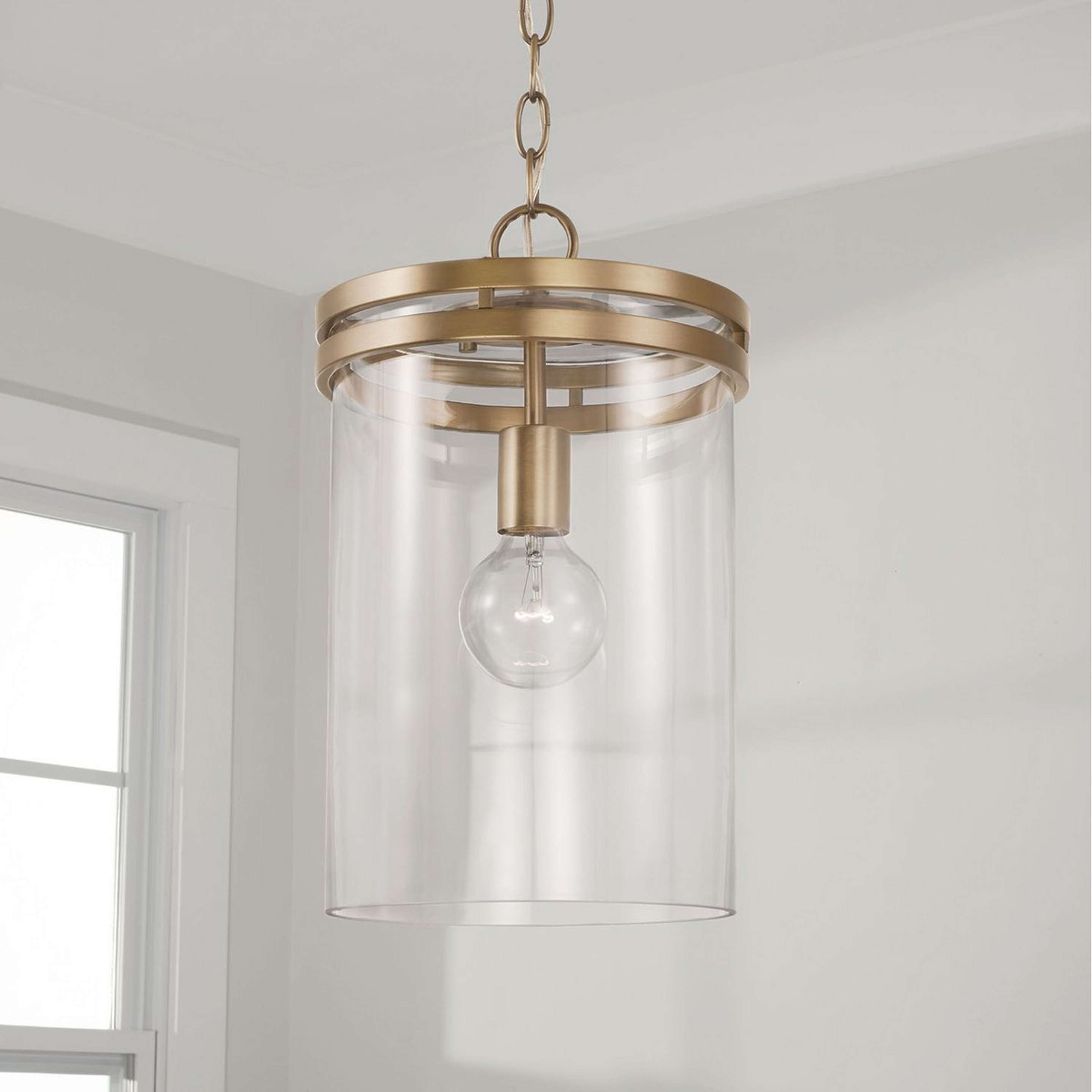 A Neysha Pendant with Aged Brass / Clear Glass color