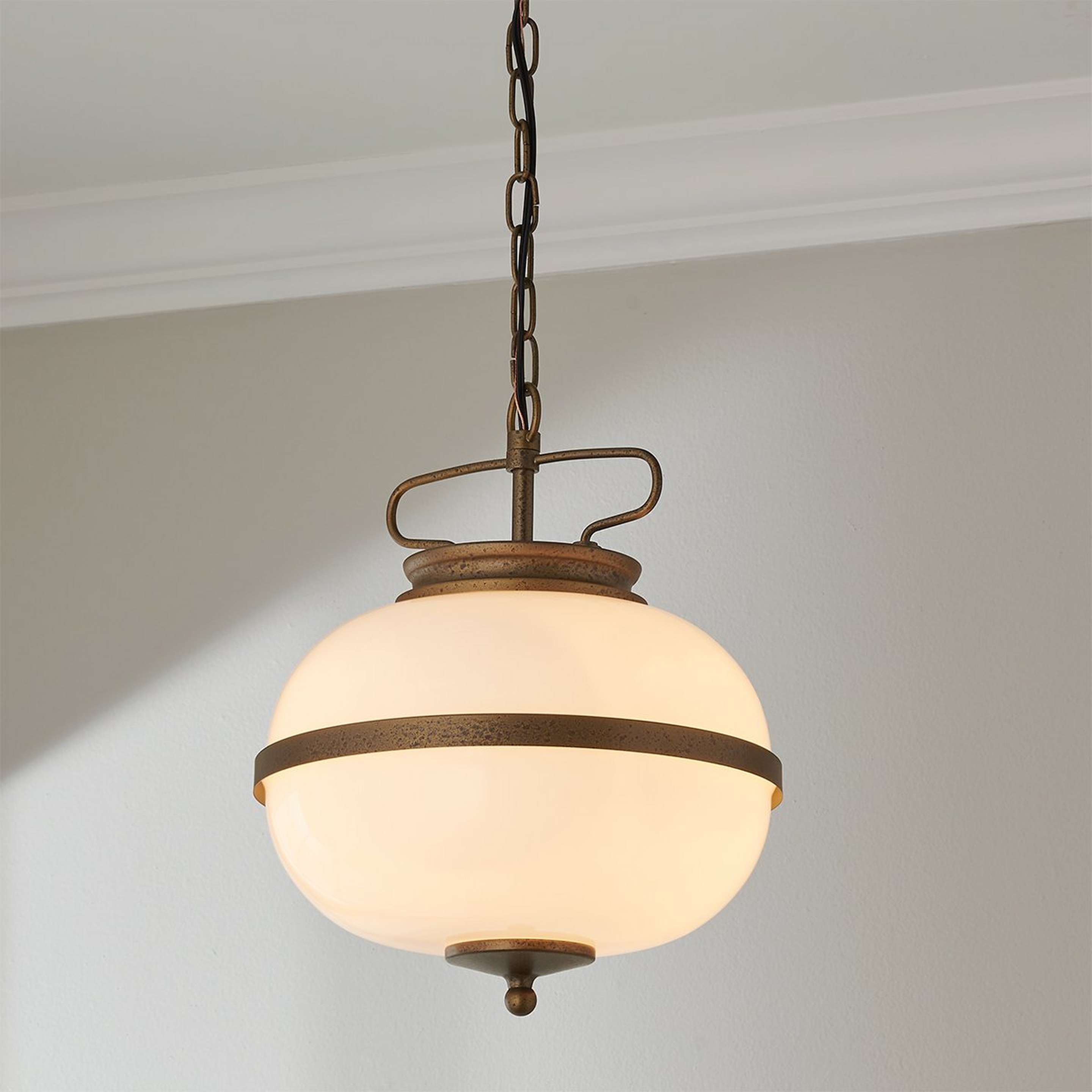 A Dimarco Pendant with Aged Bronze / Opal Glass color