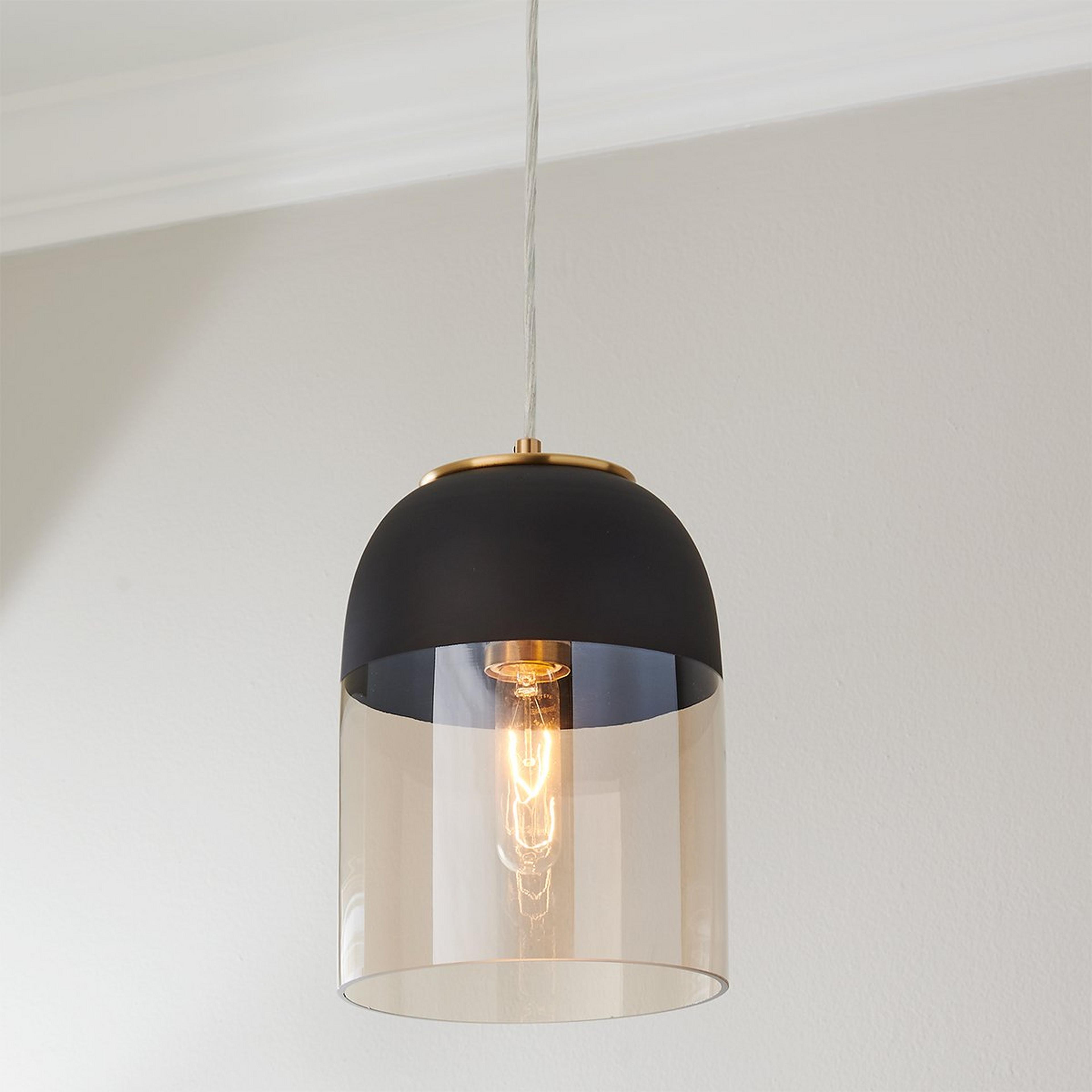 A Black Capped Amber Glass Pendant with Brushed Brass / Black / Amber color