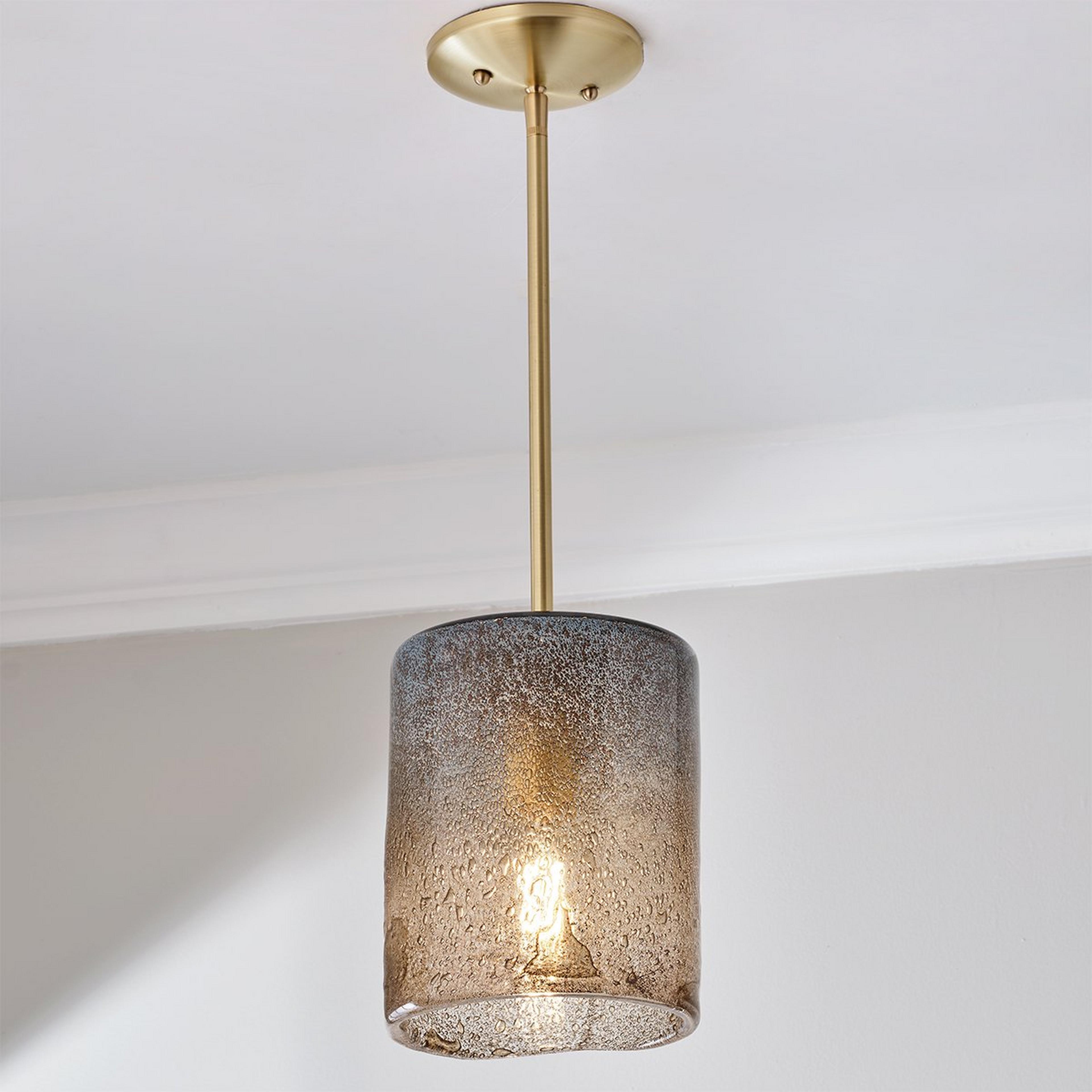 A Paxos Port Pendant with Brushed Brass / Blue / Amber color