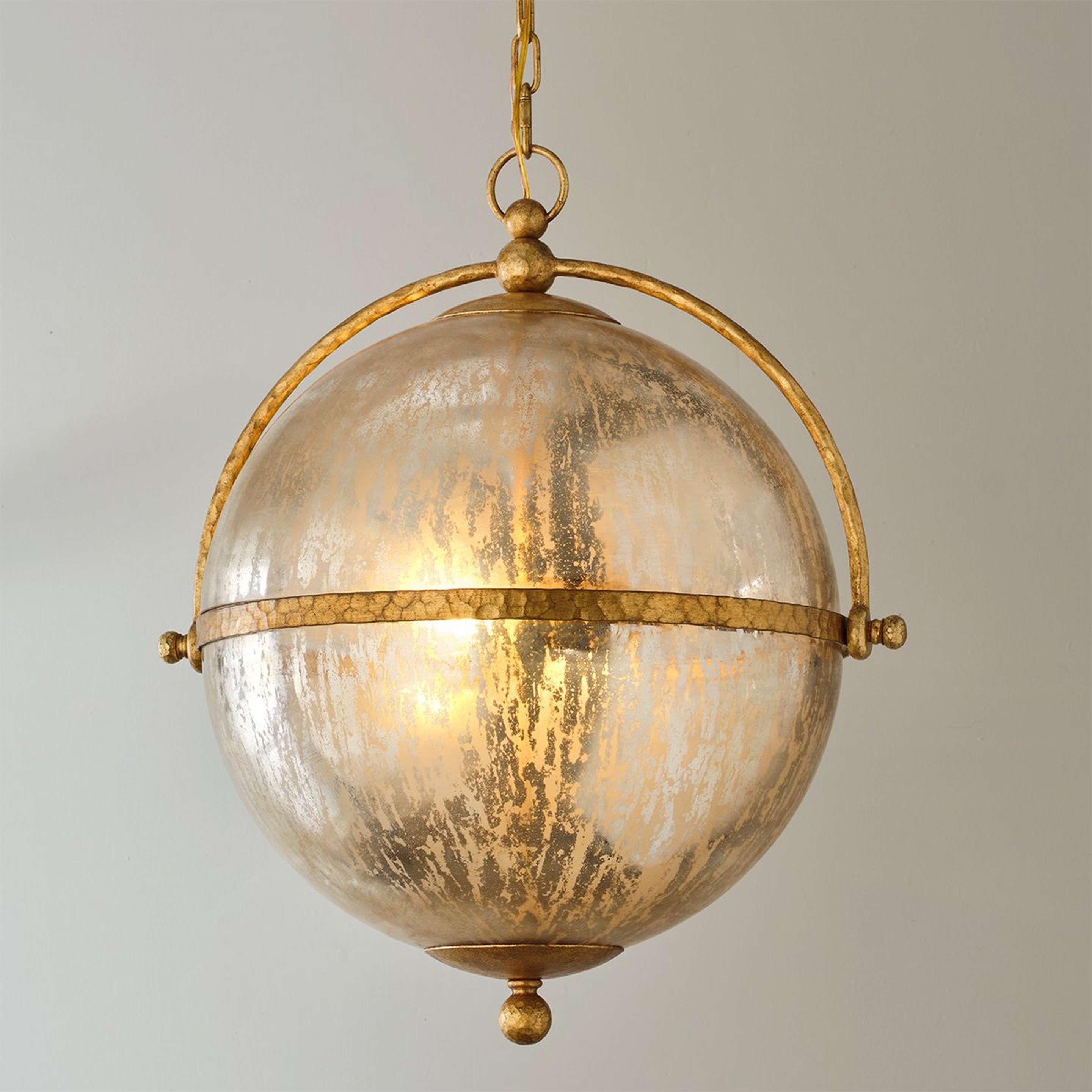 A Manchester Pendant with Gilded Iron color