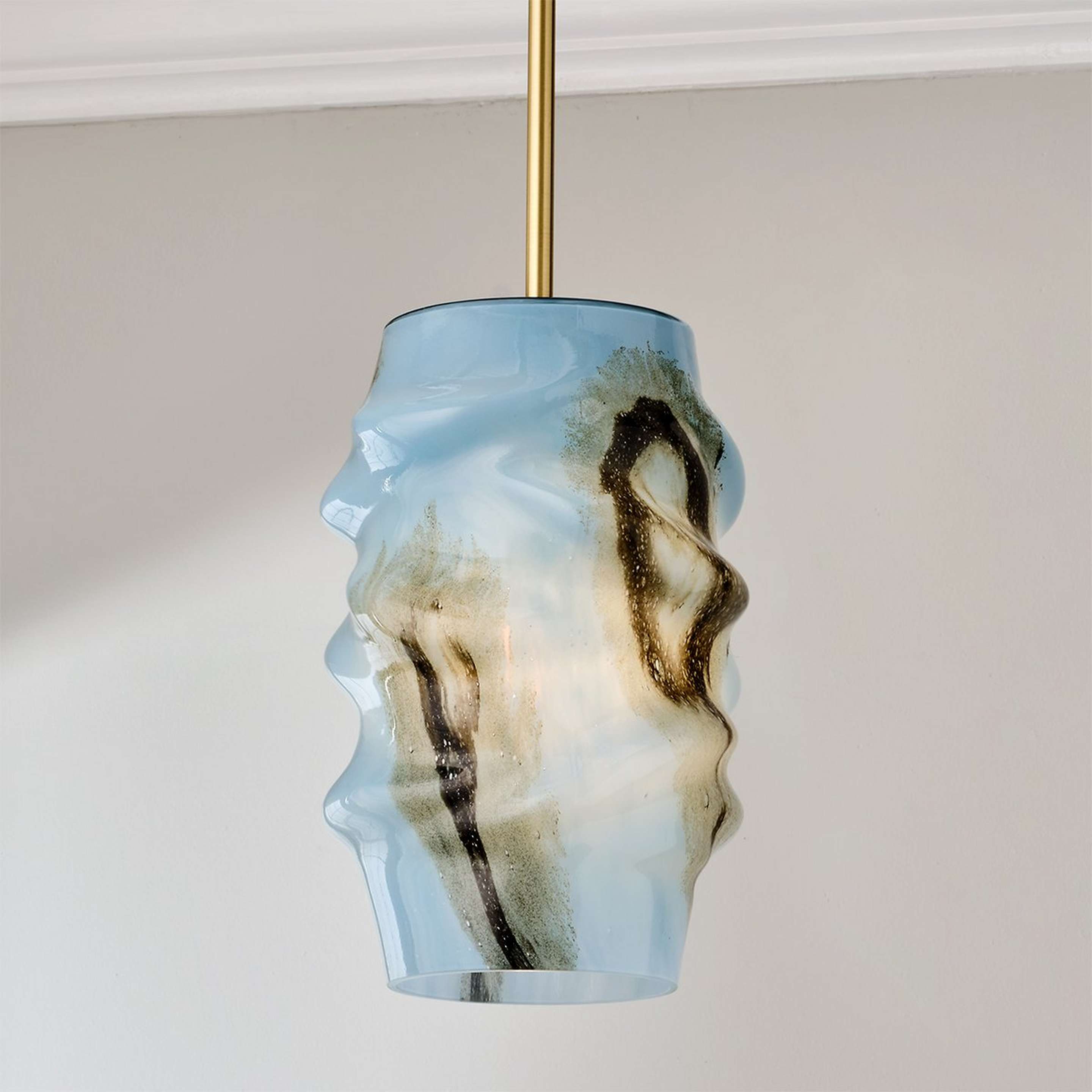 A Nexus Swirl Pendant with Brushed Brass / Blue color