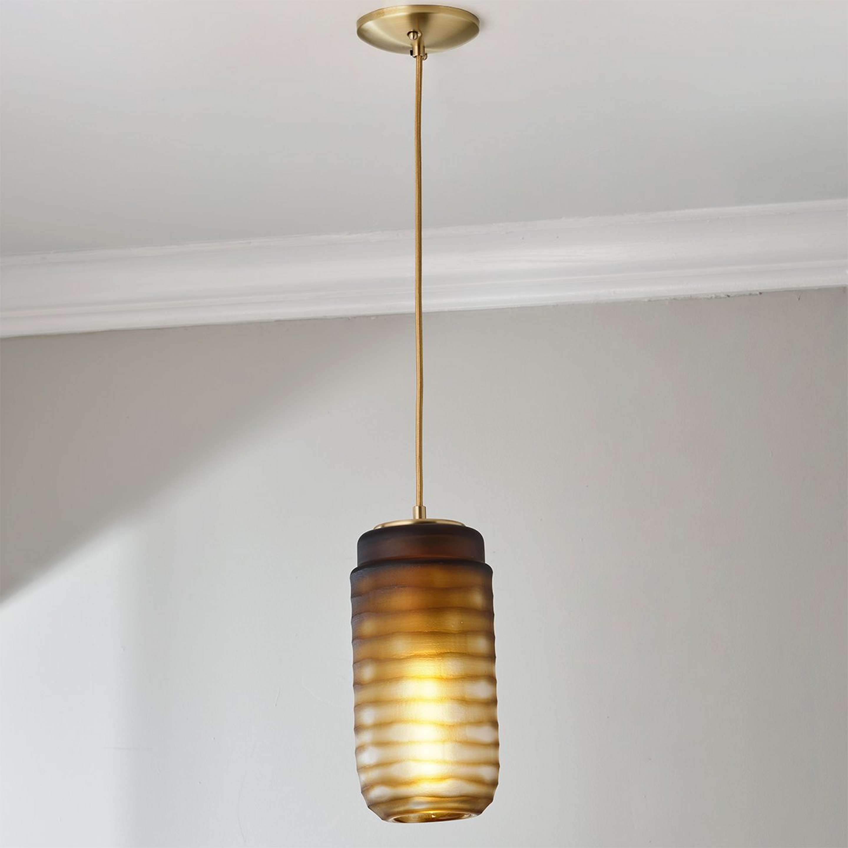 A Sirocco Pendant with Brushed Brass / Brown color