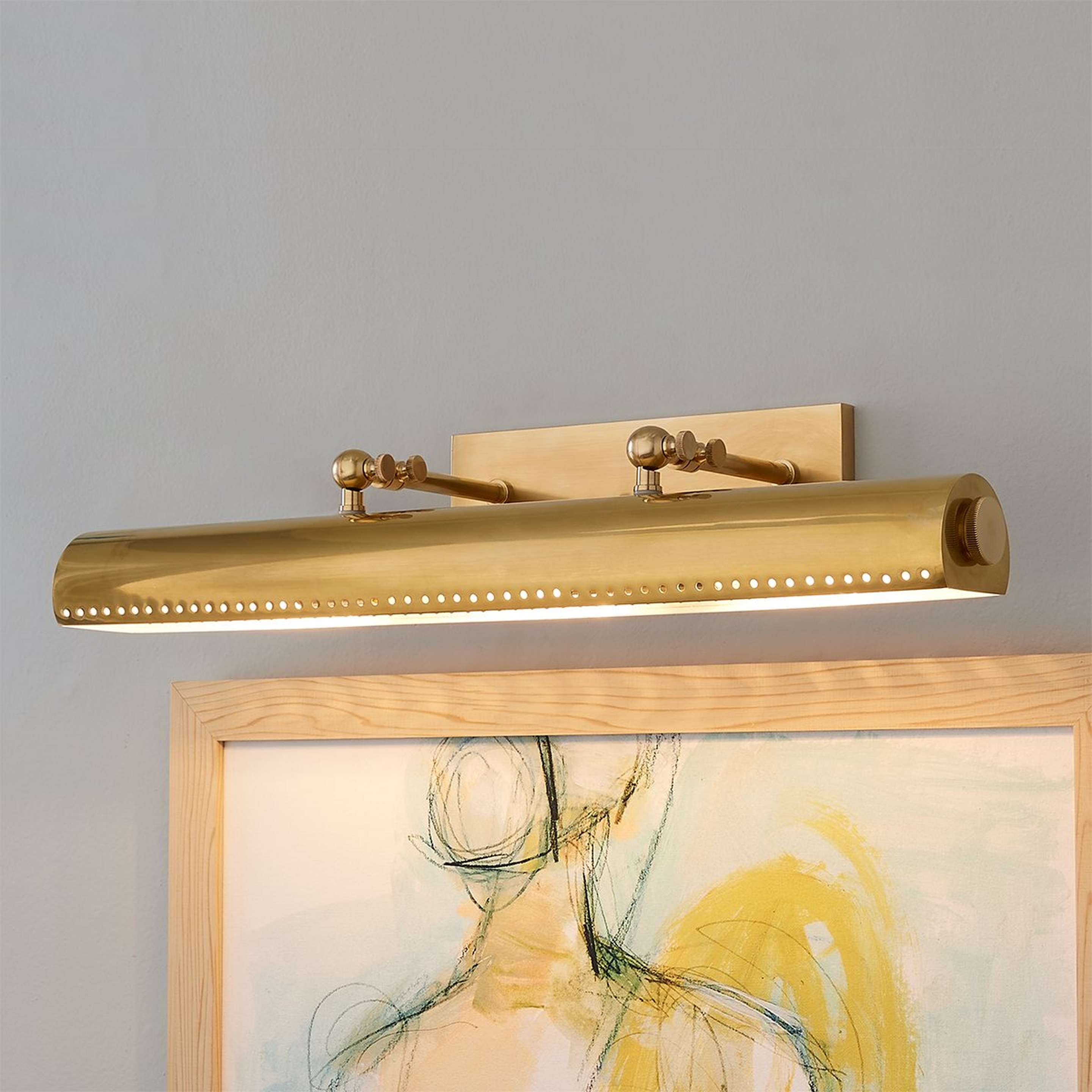 A Simplistic Luminance 23.25" Picture Light with Aged Brass color