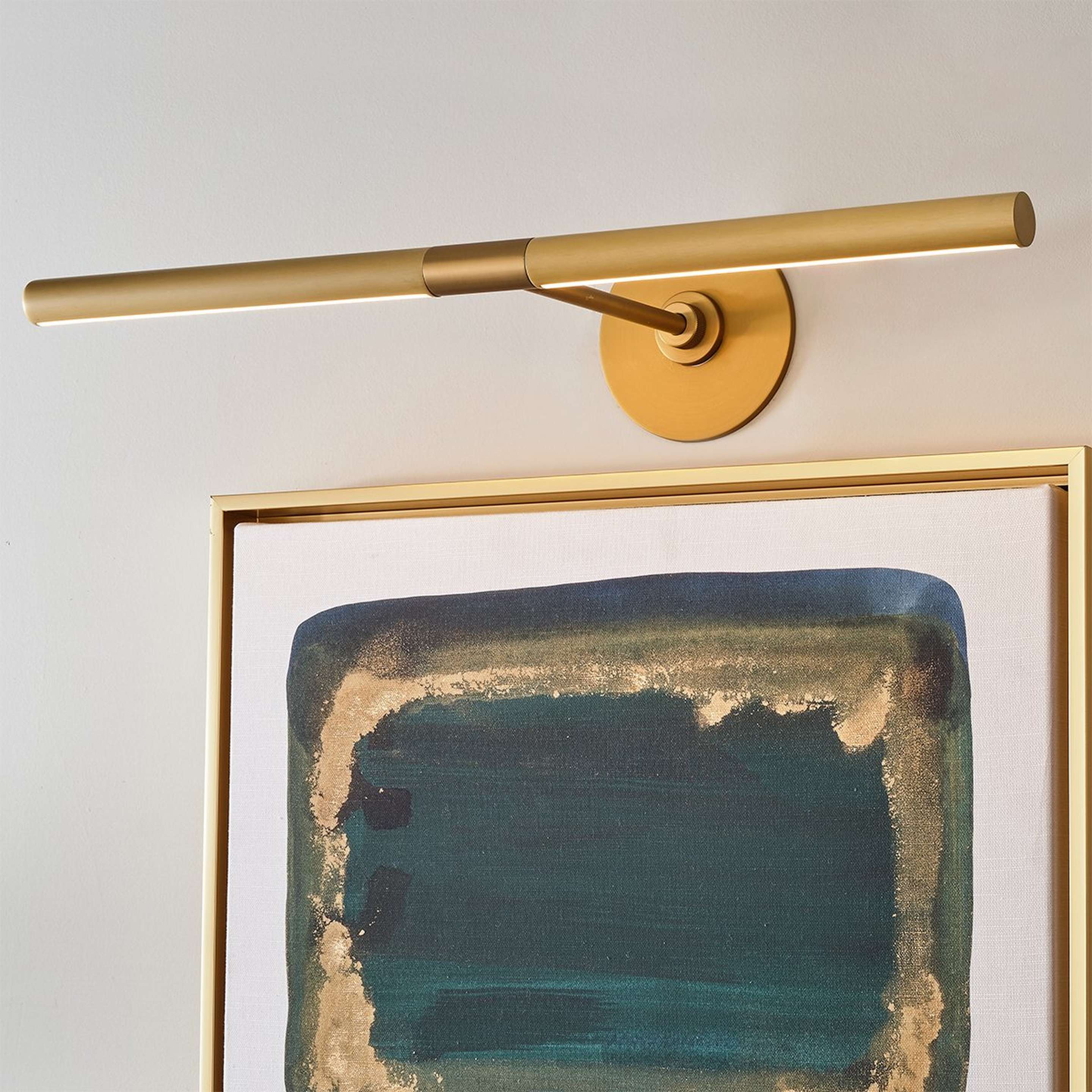 A 23" Holden LED Picture Light with Gold color
