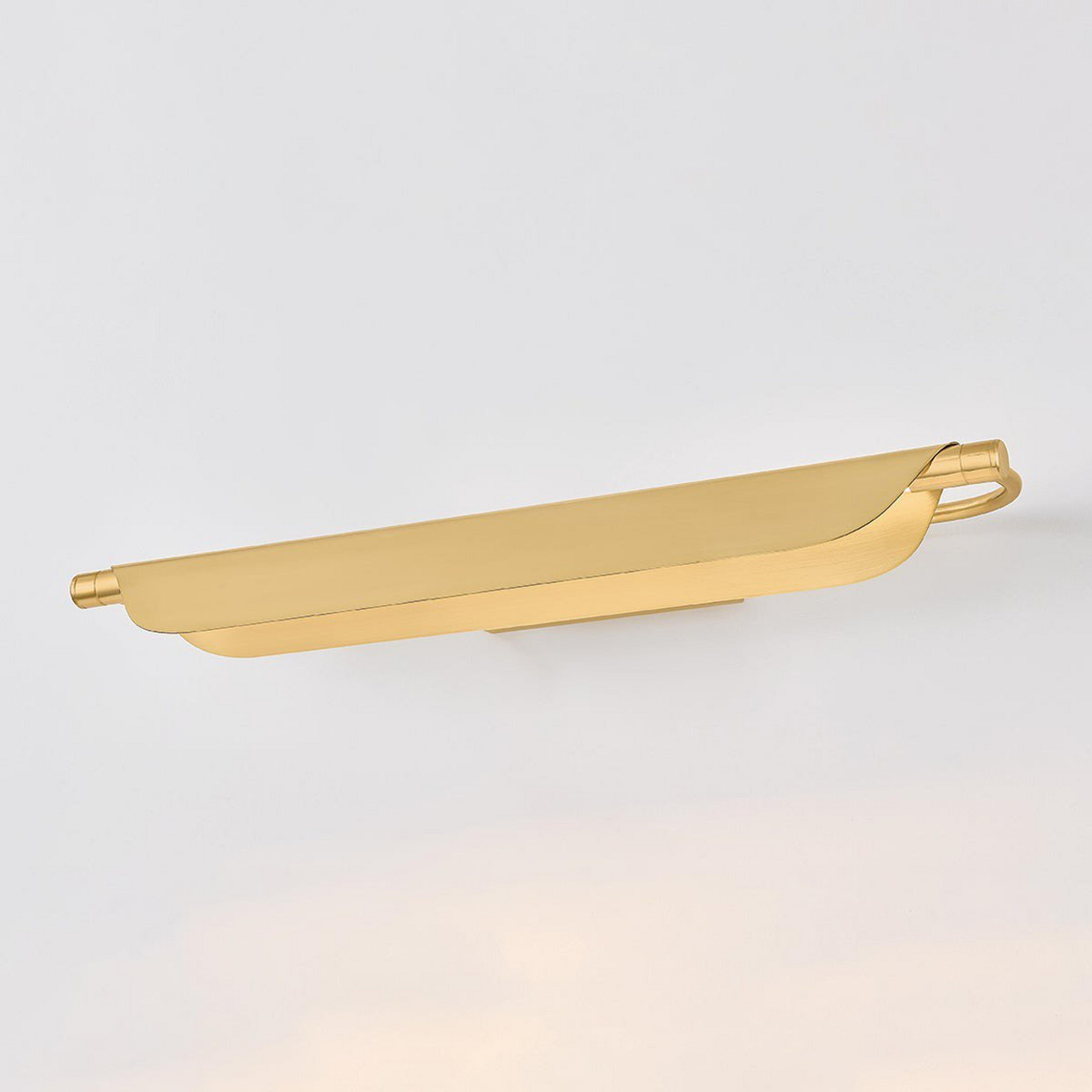 A Kirtesh LED Picture Light - 27" with Brass color