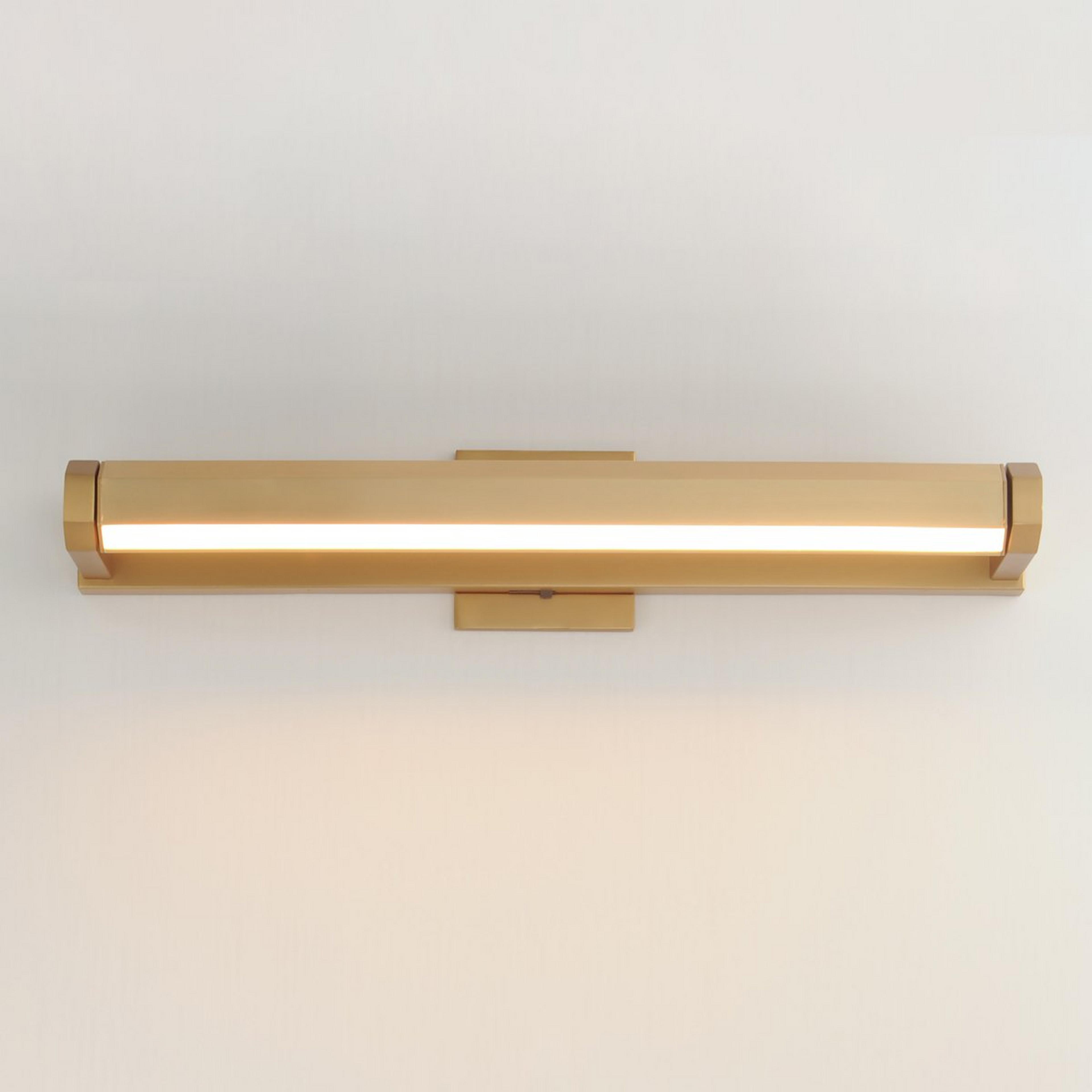 A Carya LED Picture Light - Medium with Gold color