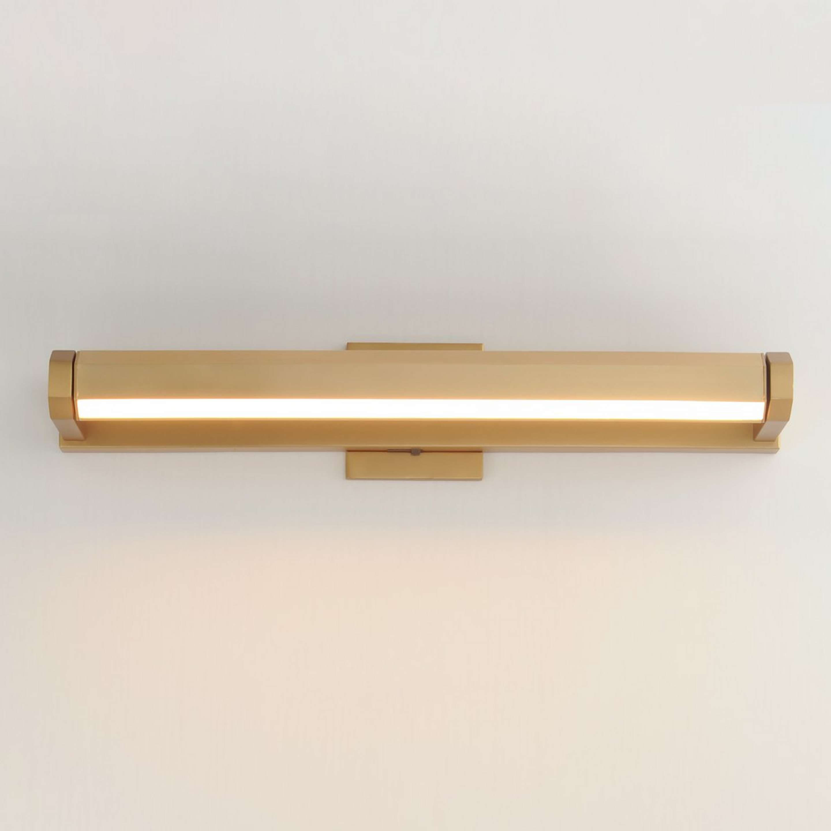 A Carya LED Picture Light - Medium with Gold color