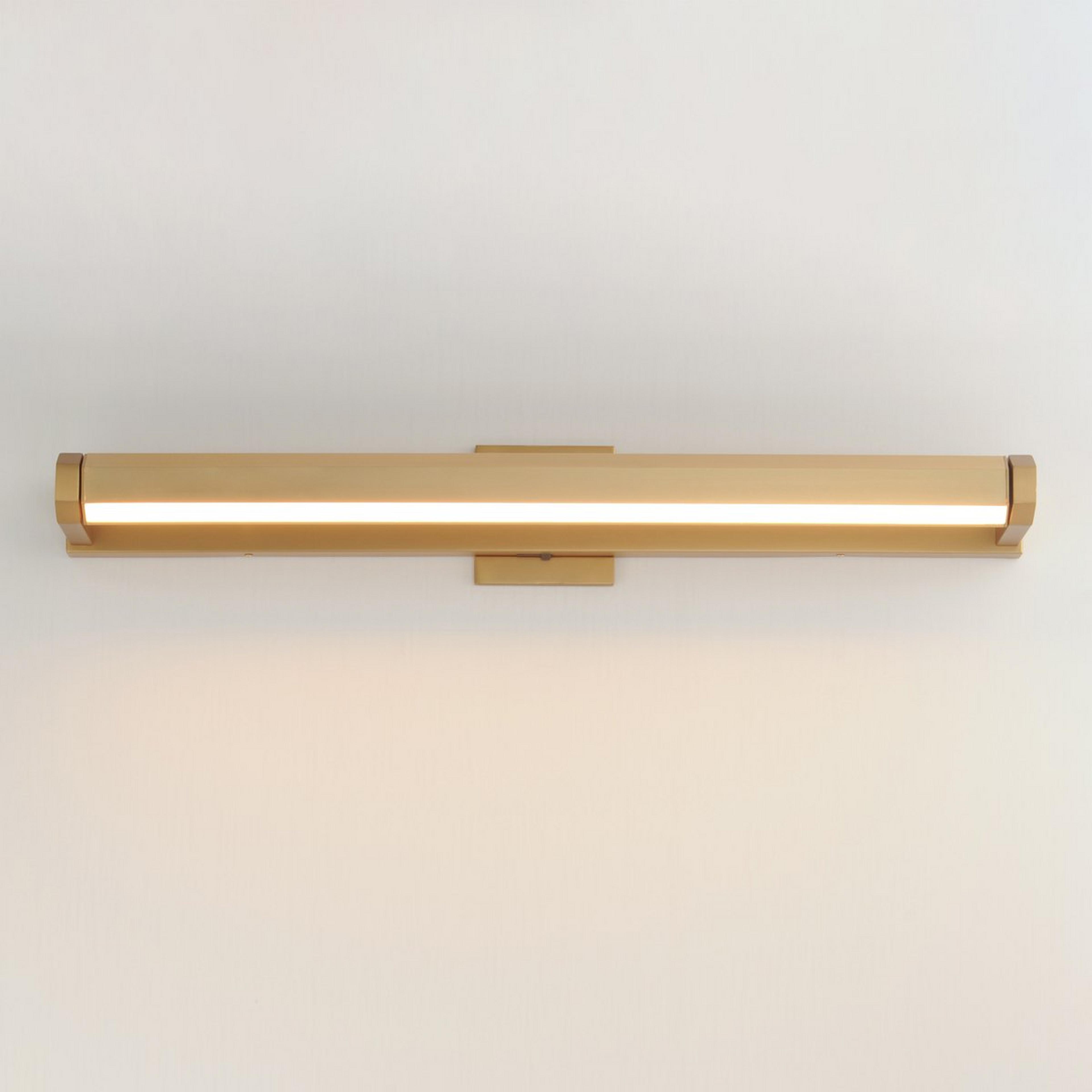 A Carya LED Picture Light - Large with Gold color