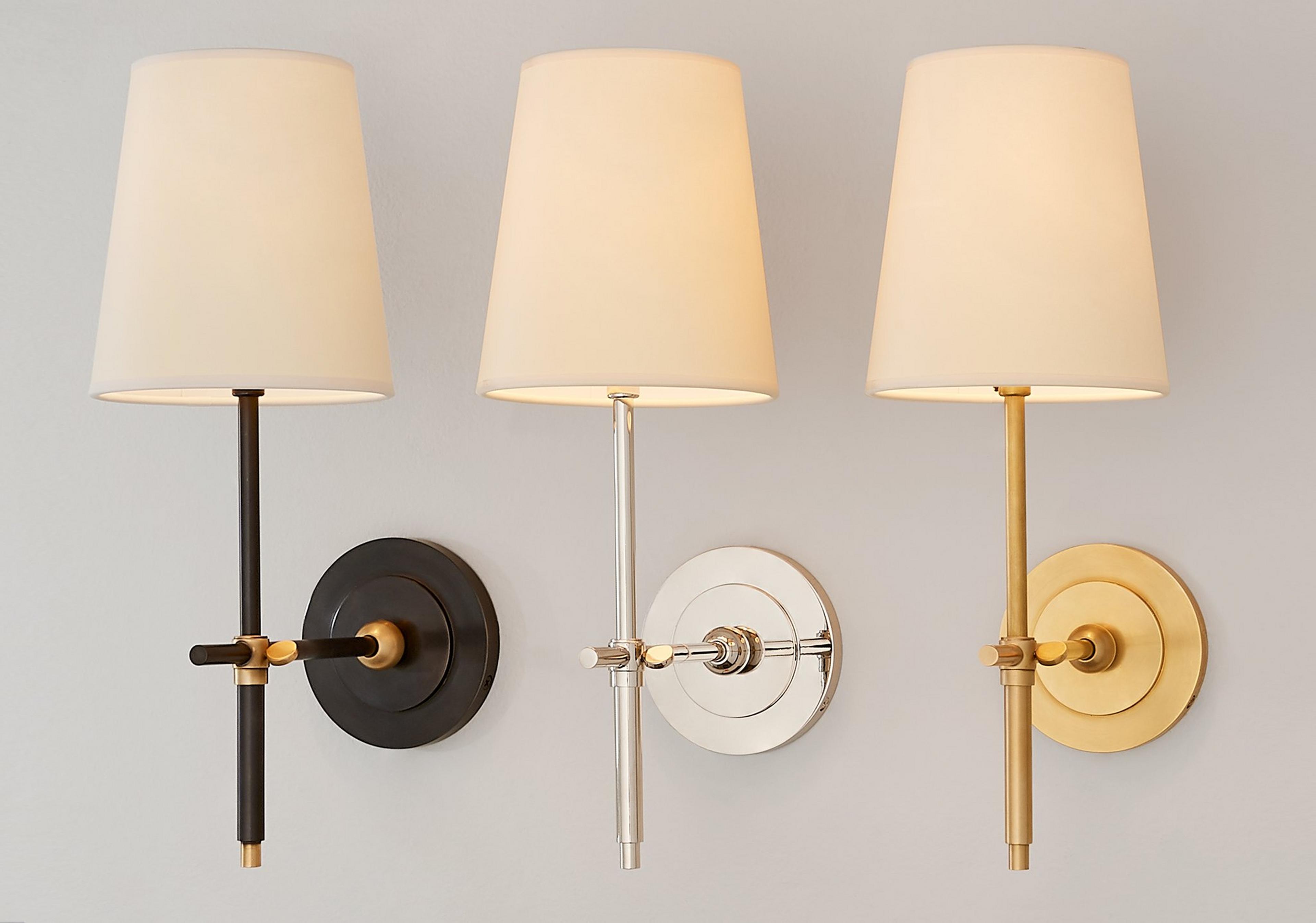 Collection of soho sconces on a gray wall