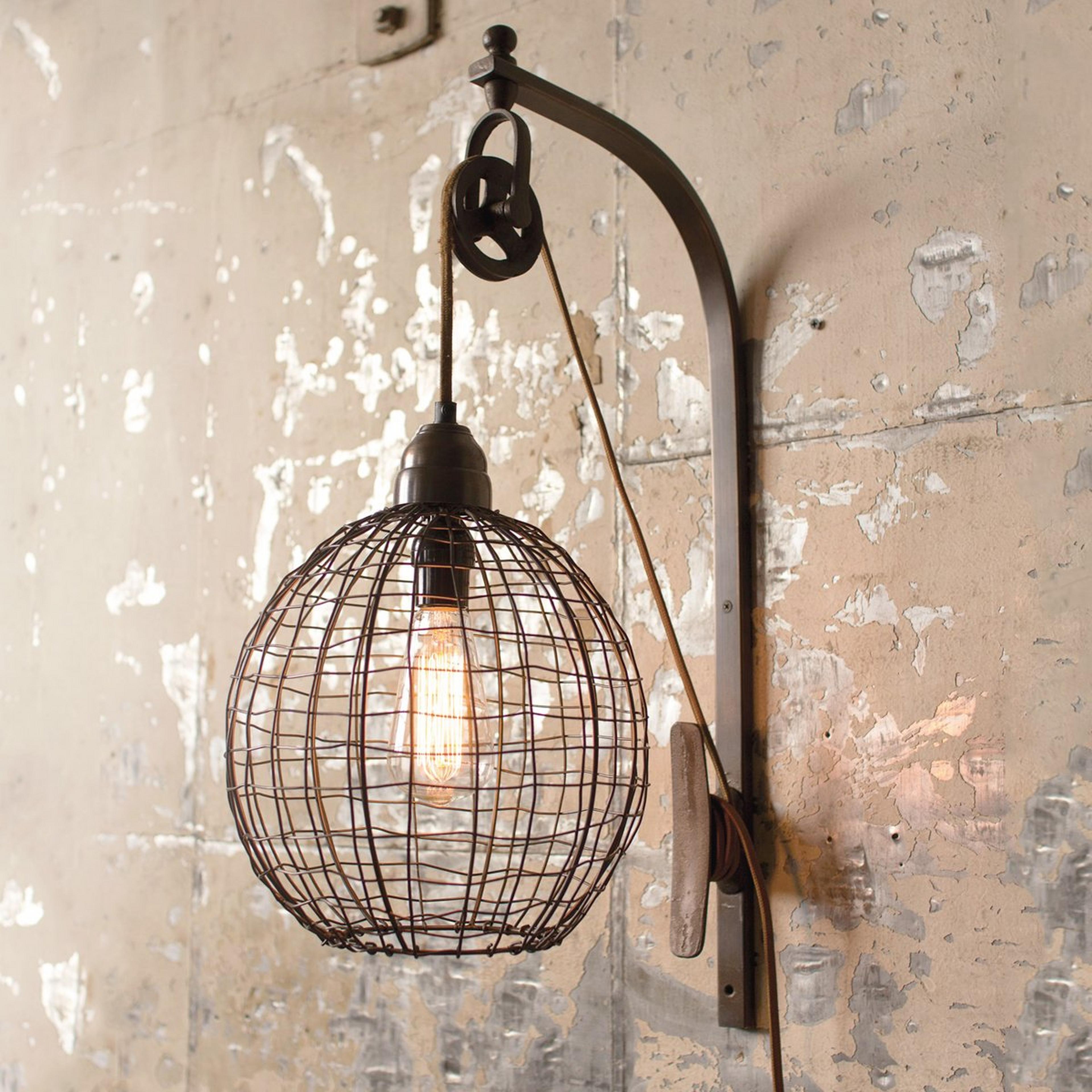 A Wire Sphere Pulley Sconce with Bronze color
