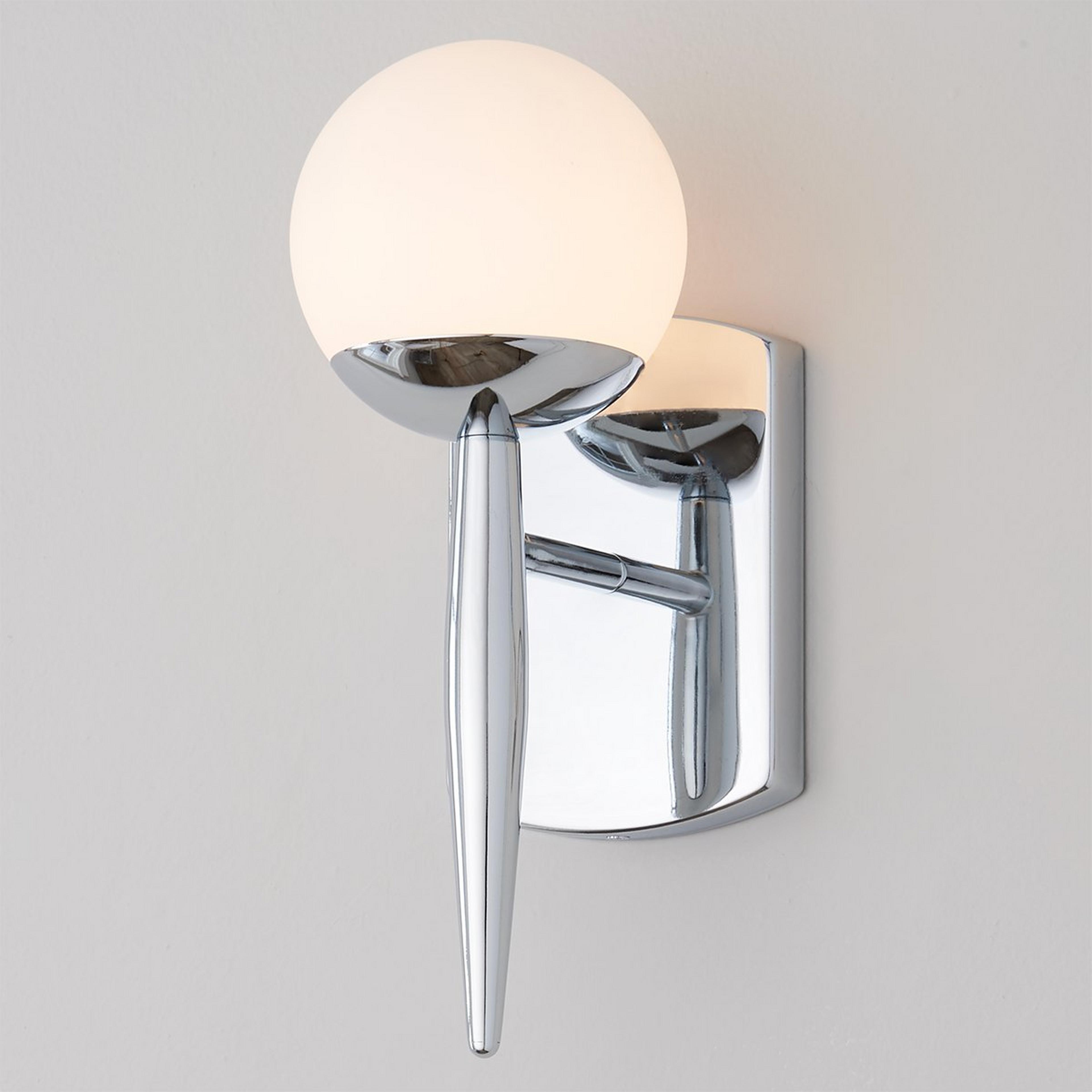 A Linear Globe Sconce with Chrome color