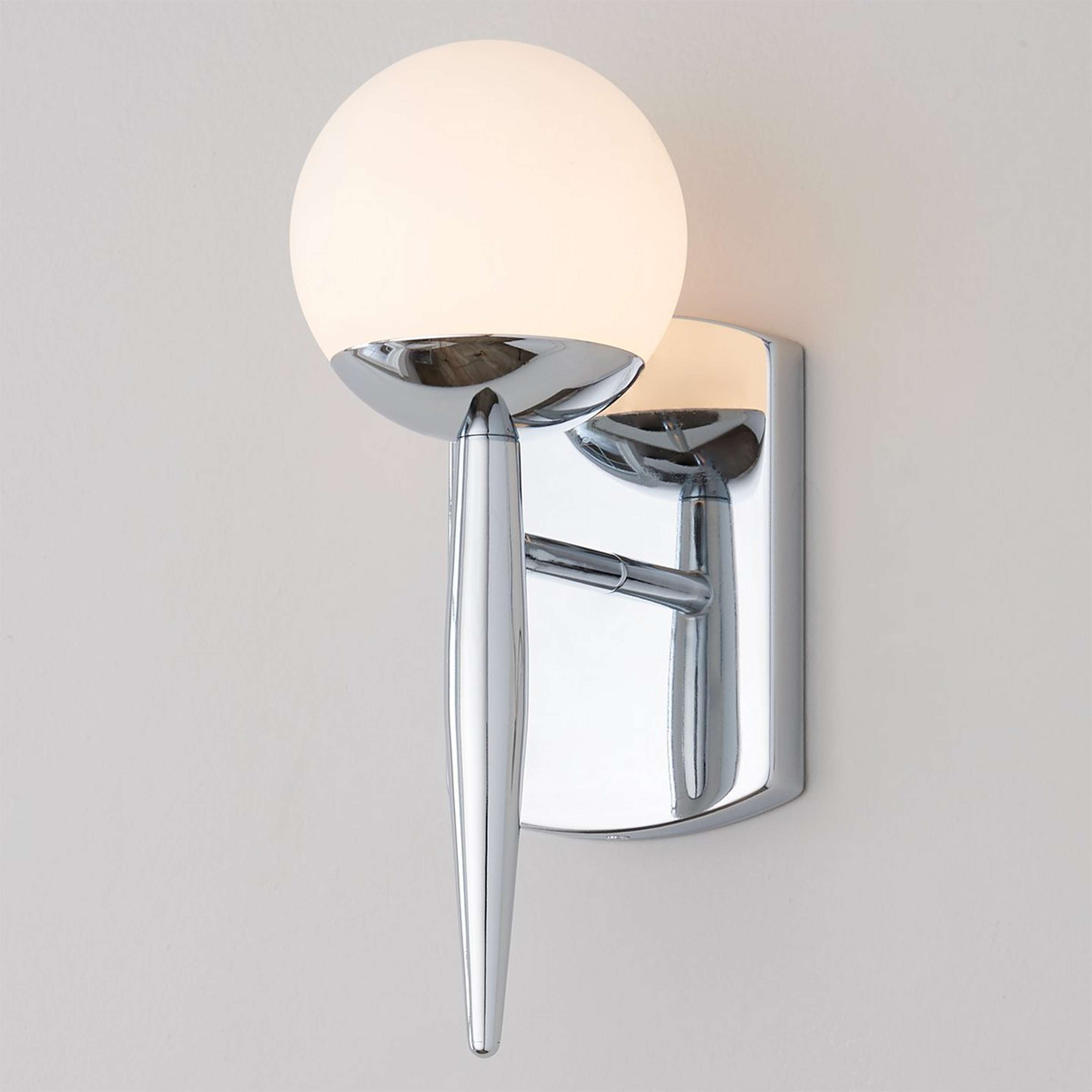 A Linear Globe Sconce with Chrome color