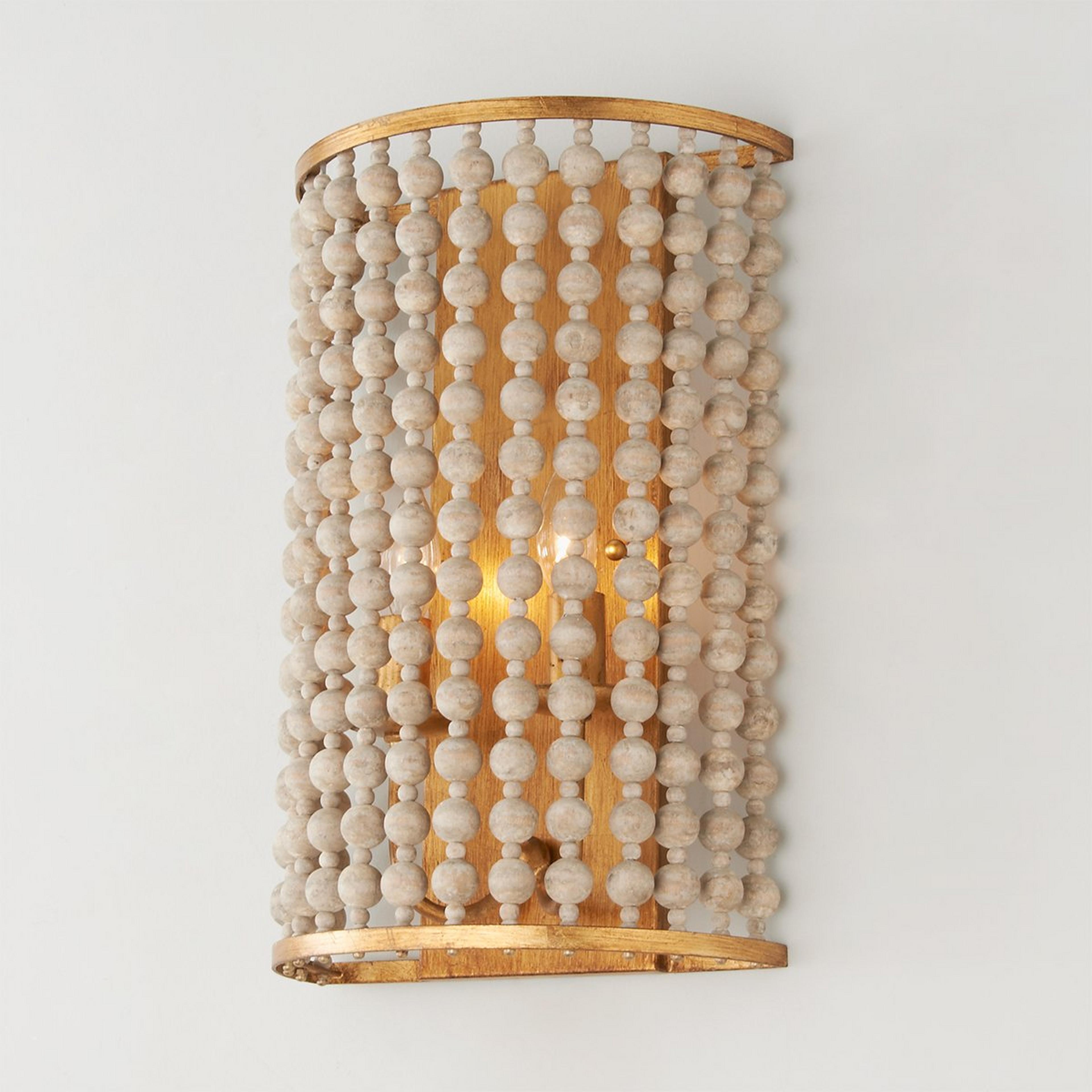 A Rustic Beaded Cylinder Sconce with Gold Leaf color