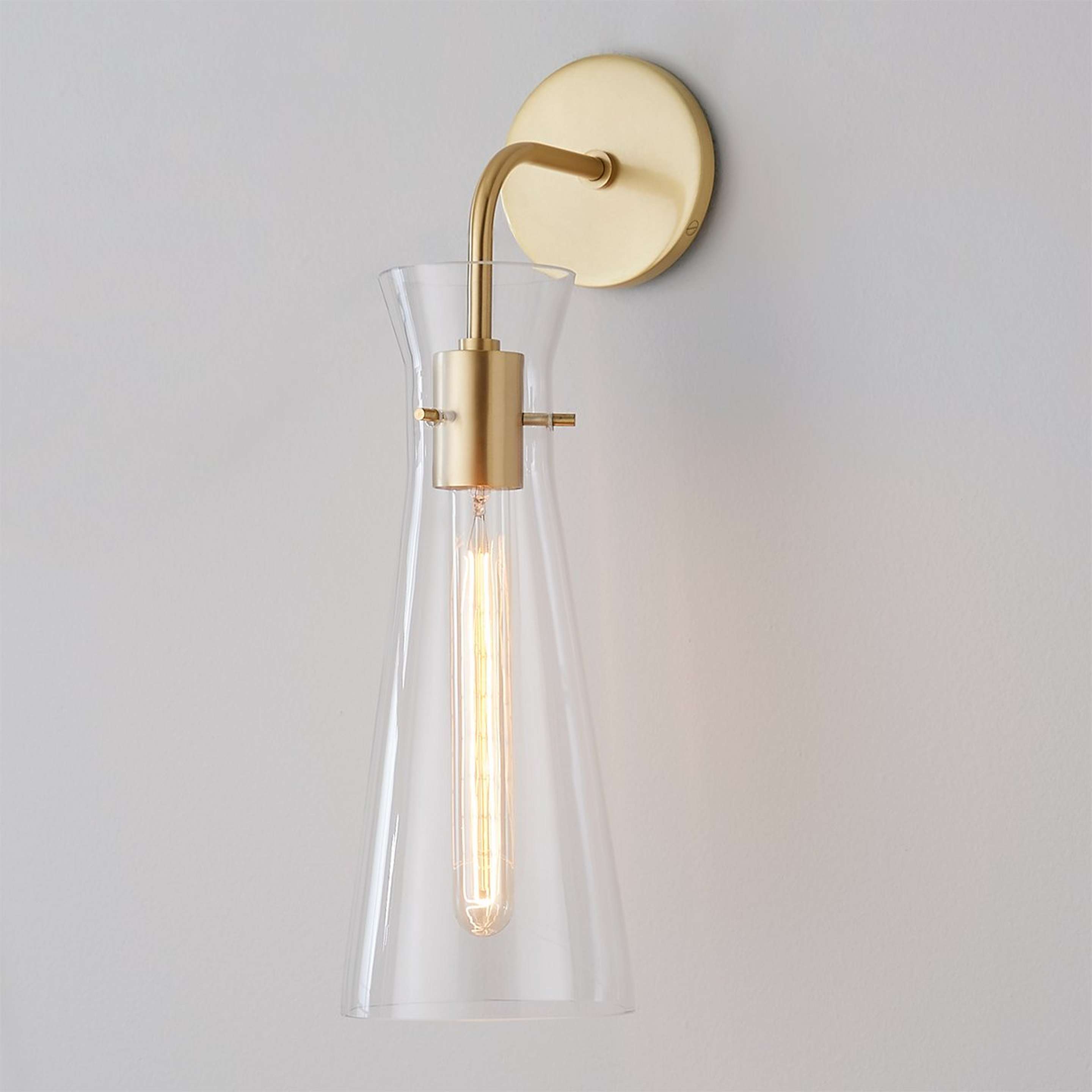 A Minimalist Flare Sconce with Aged Brass color