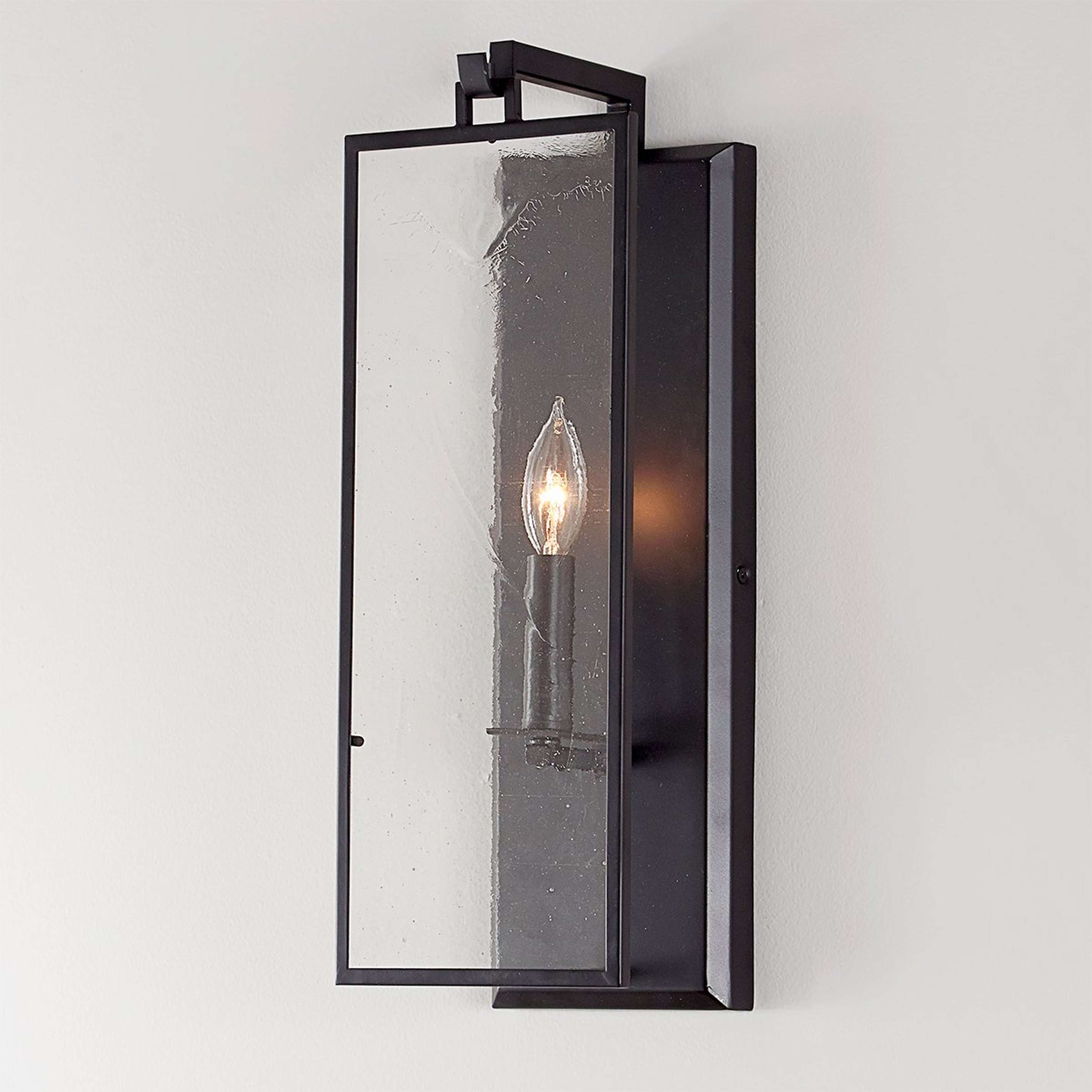 A Simply Blake Sconce with Matte Black / Antique Glass color