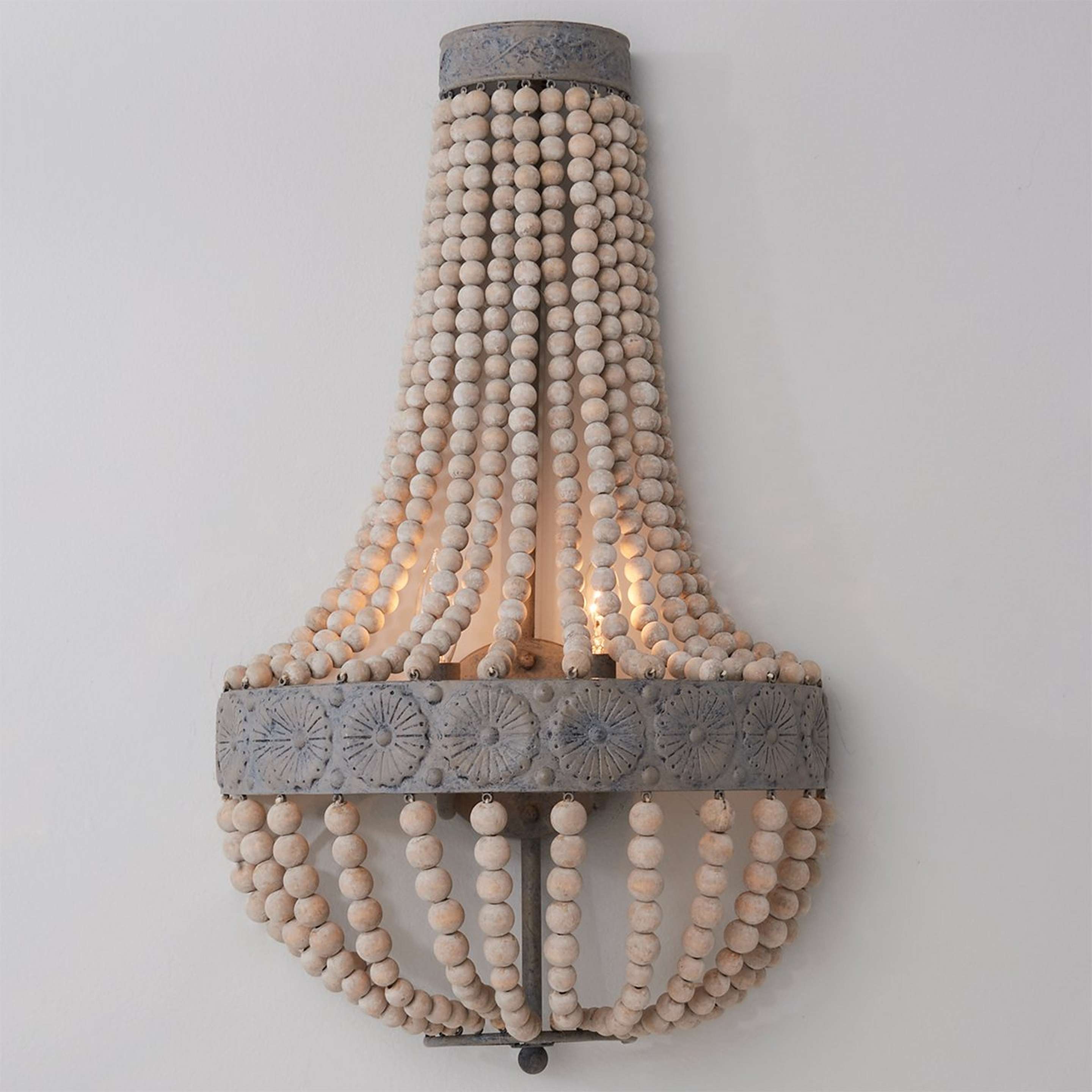 A Aged Wood Beaded Sconce with Distressed Gray Wash color