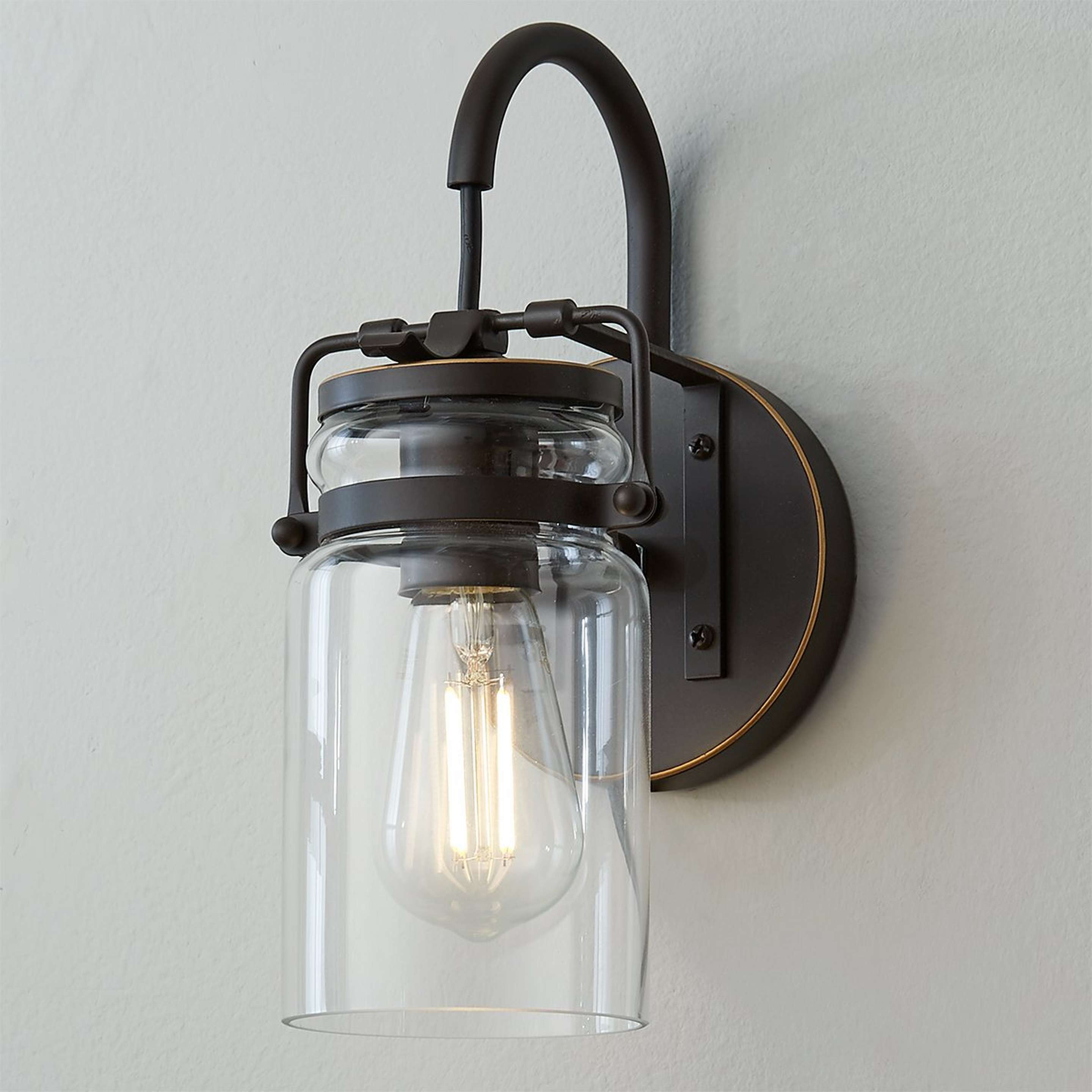 A Modern Mason Jar Sconce with Bronze color