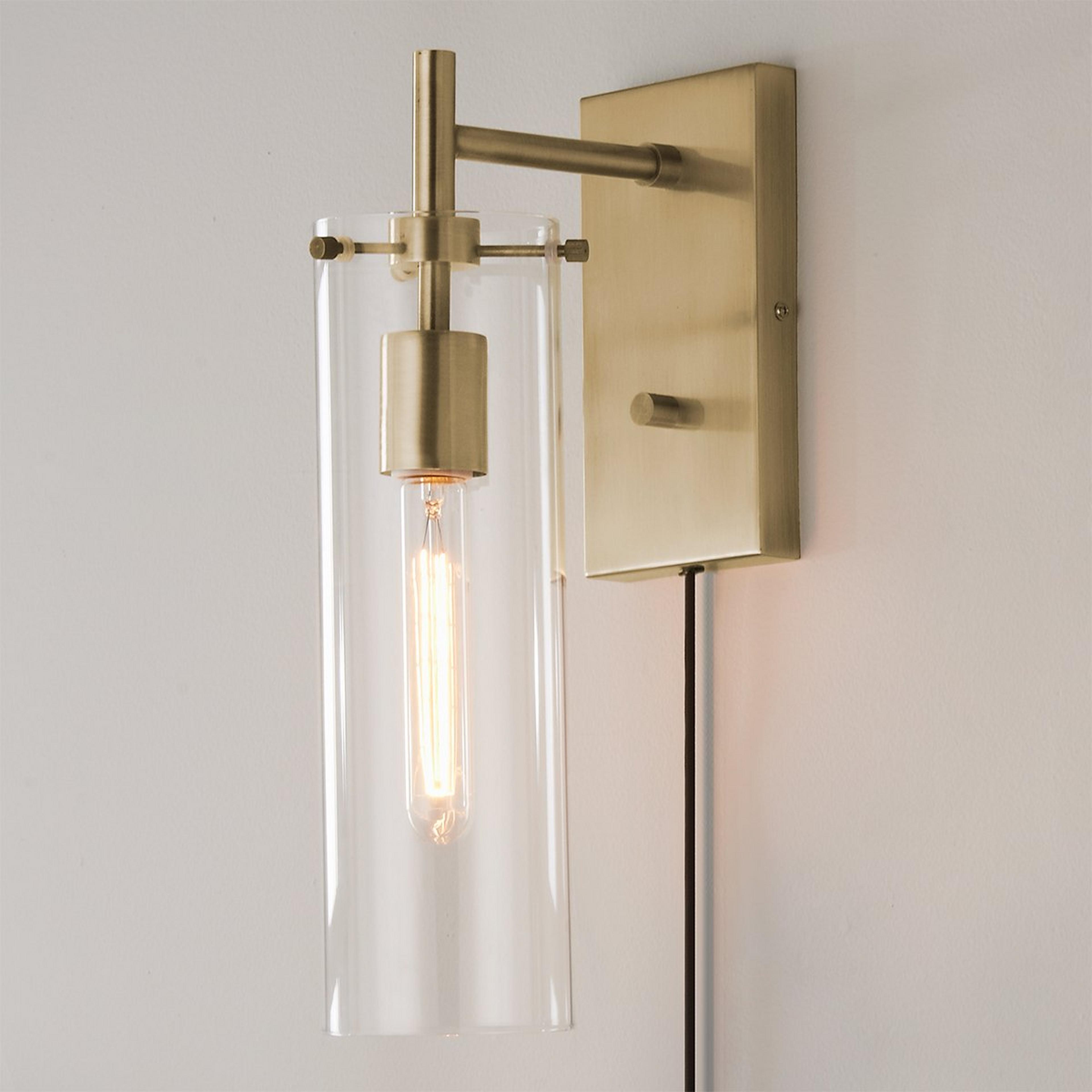 A Tubular Vintage Wall Sconce with Antique Brass color