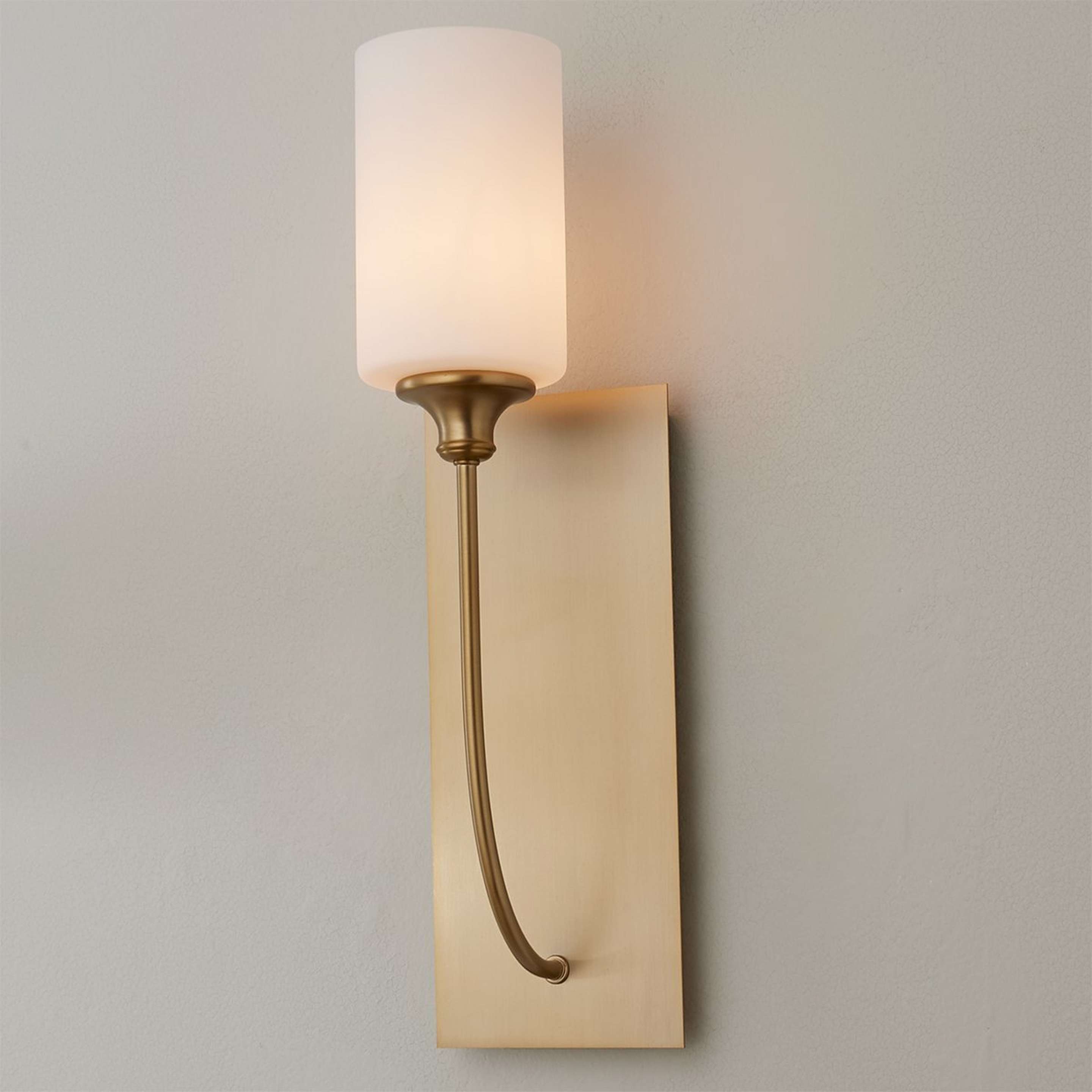 A Tracie Curved Sconce with Aged Brass / Satin Opal color