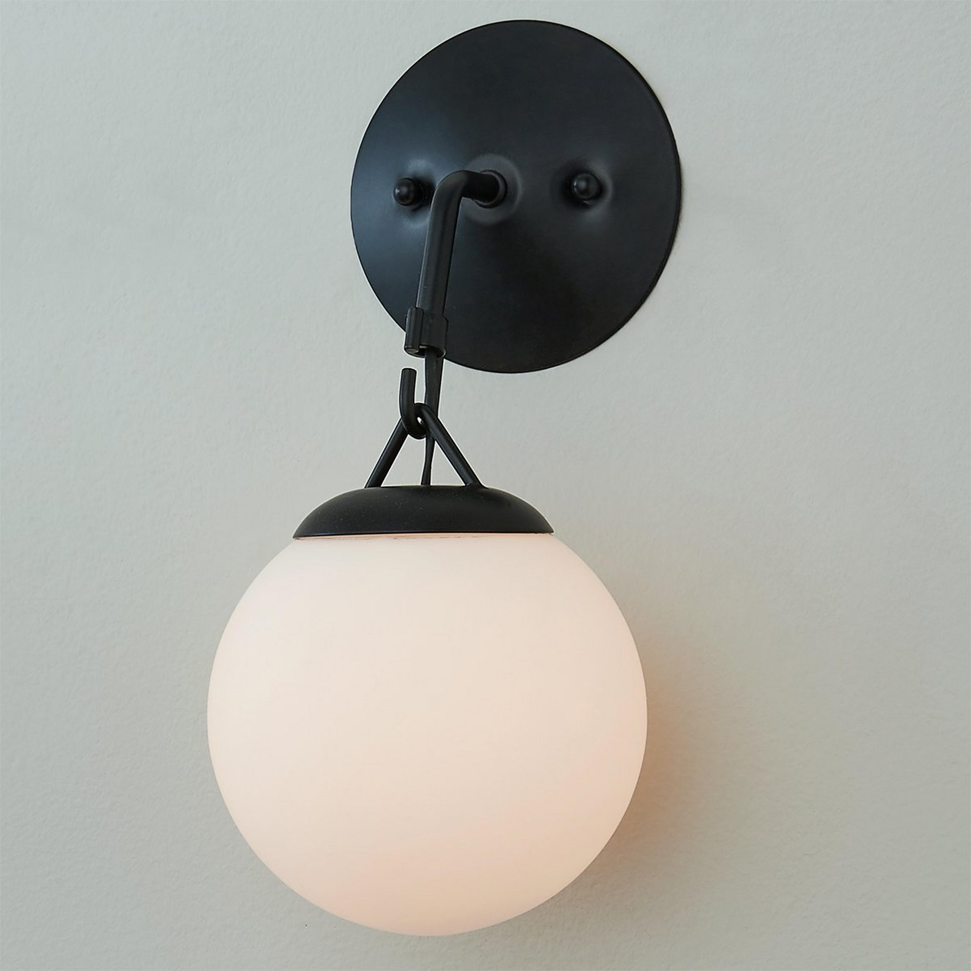 A Hooked Globe Sconce with Black color