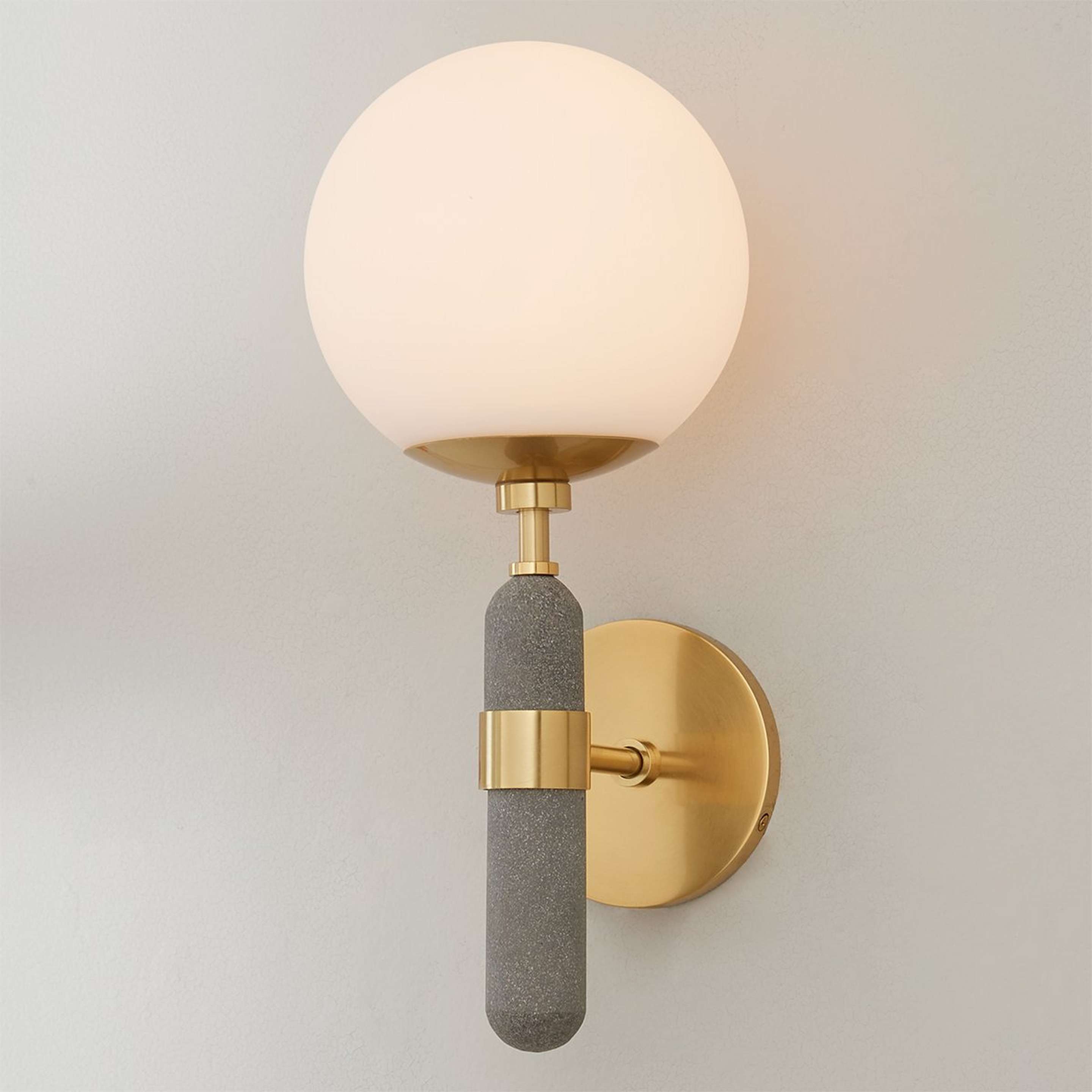 A Concrete Mod Sconce with Aged Brass / Concrete Gray color