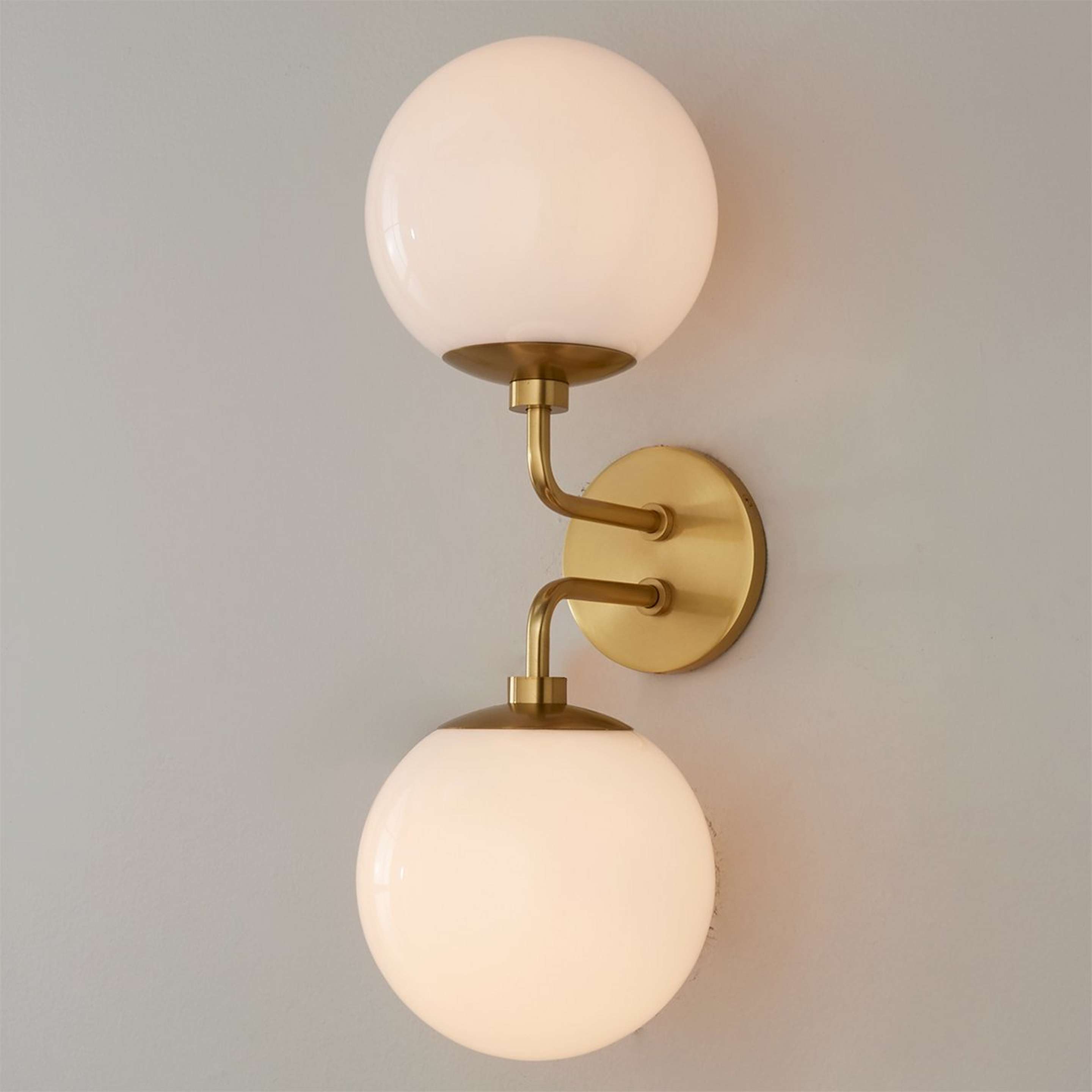 A Minimalist Globe Sconce - 2 Light with Satin Brass color