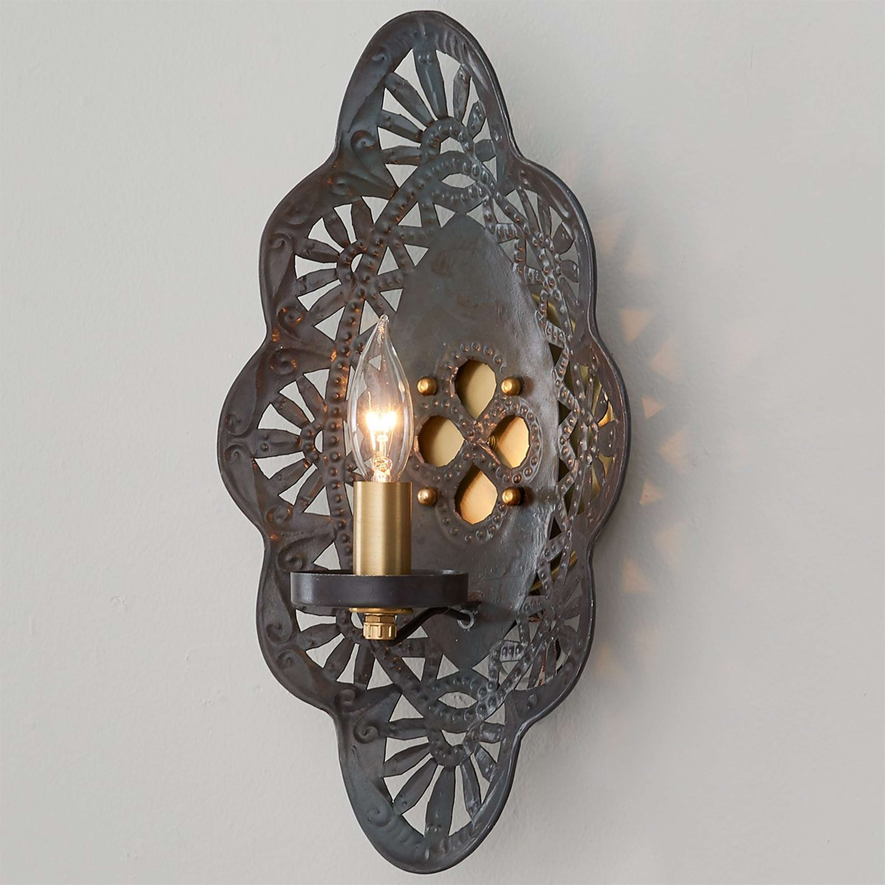 A Feleena Sconce with Brass / Aged Iron color