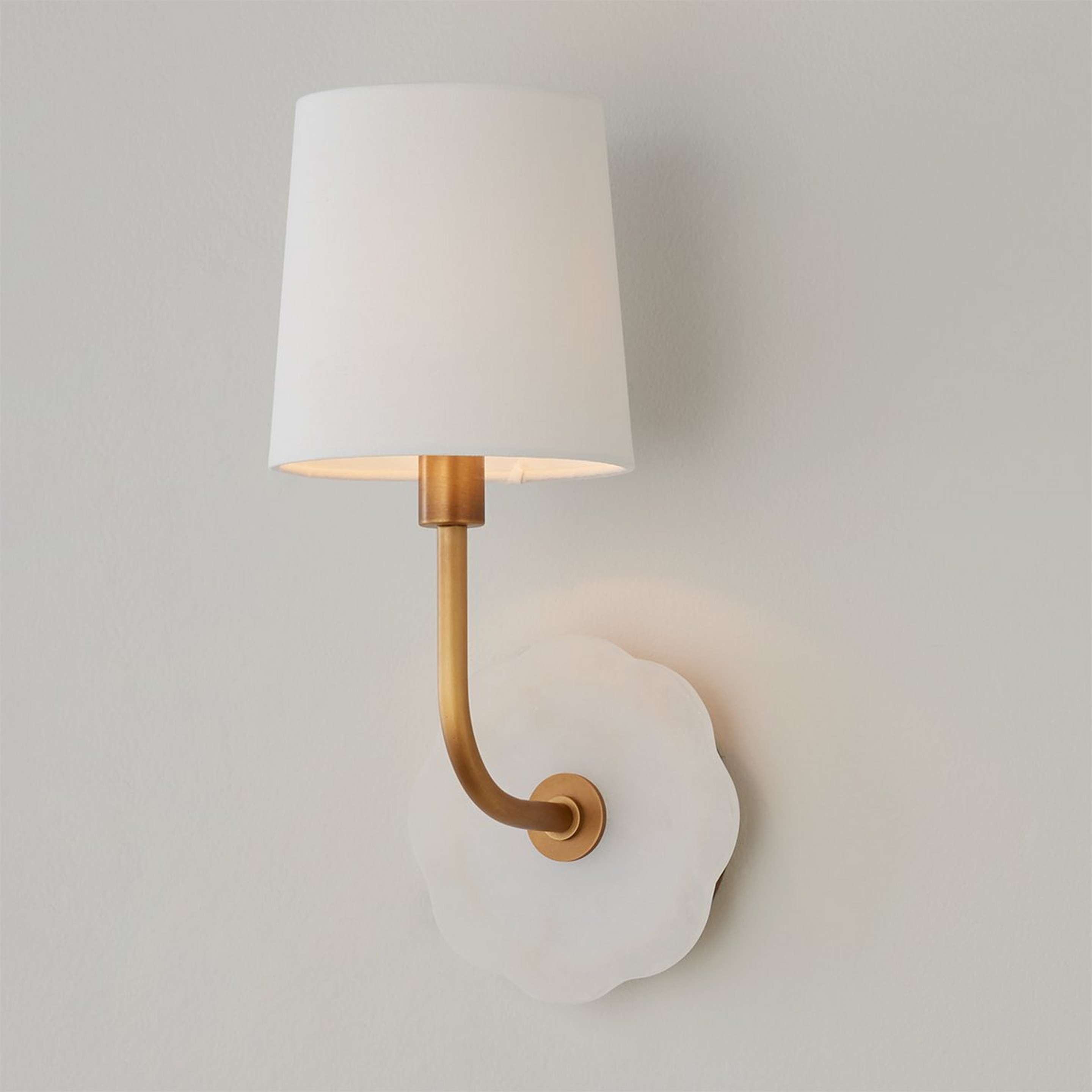 A Soft Sophistication Sconce with White / Brass color