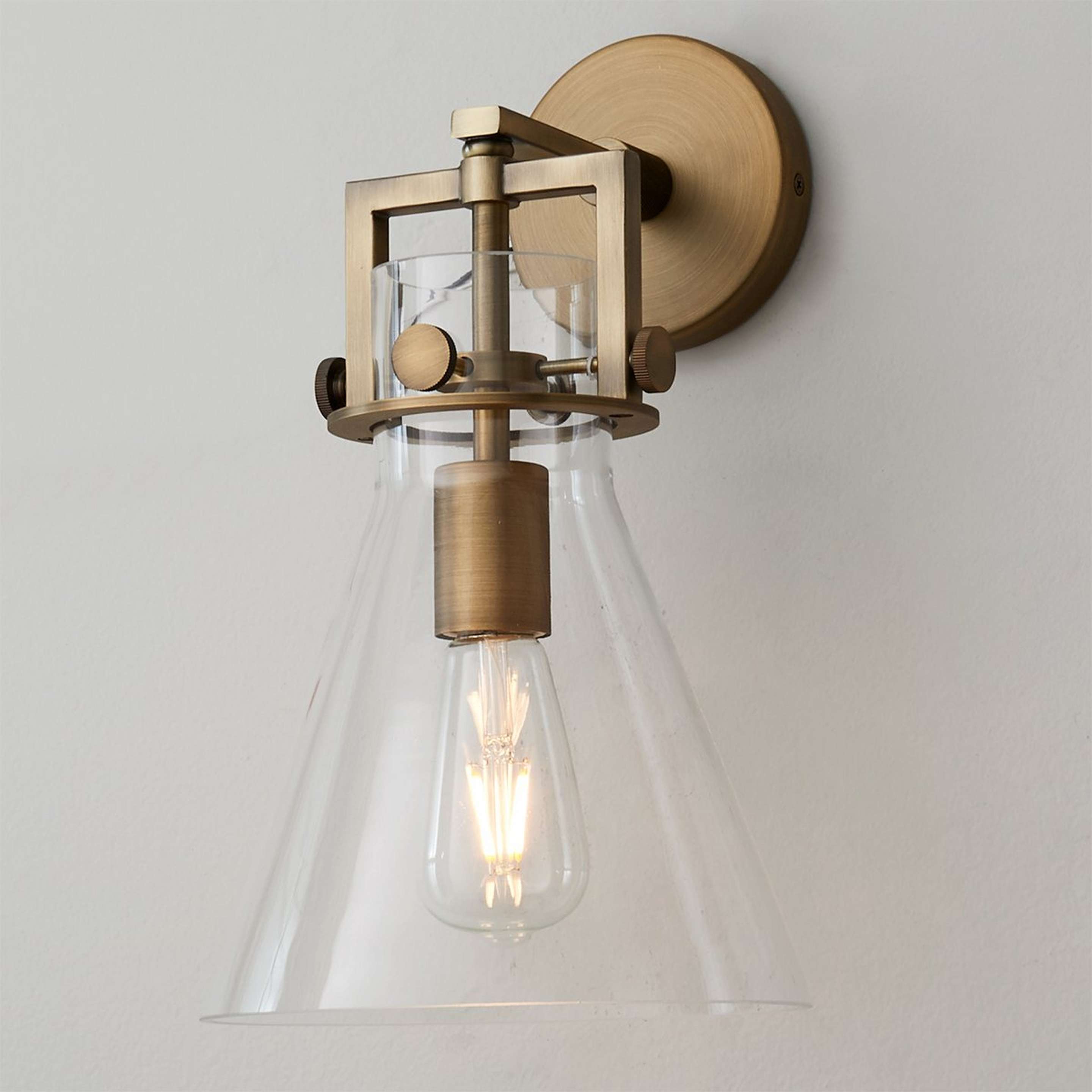 A Urban Beaker Sconce with Brushed Brass / Clear Glass color