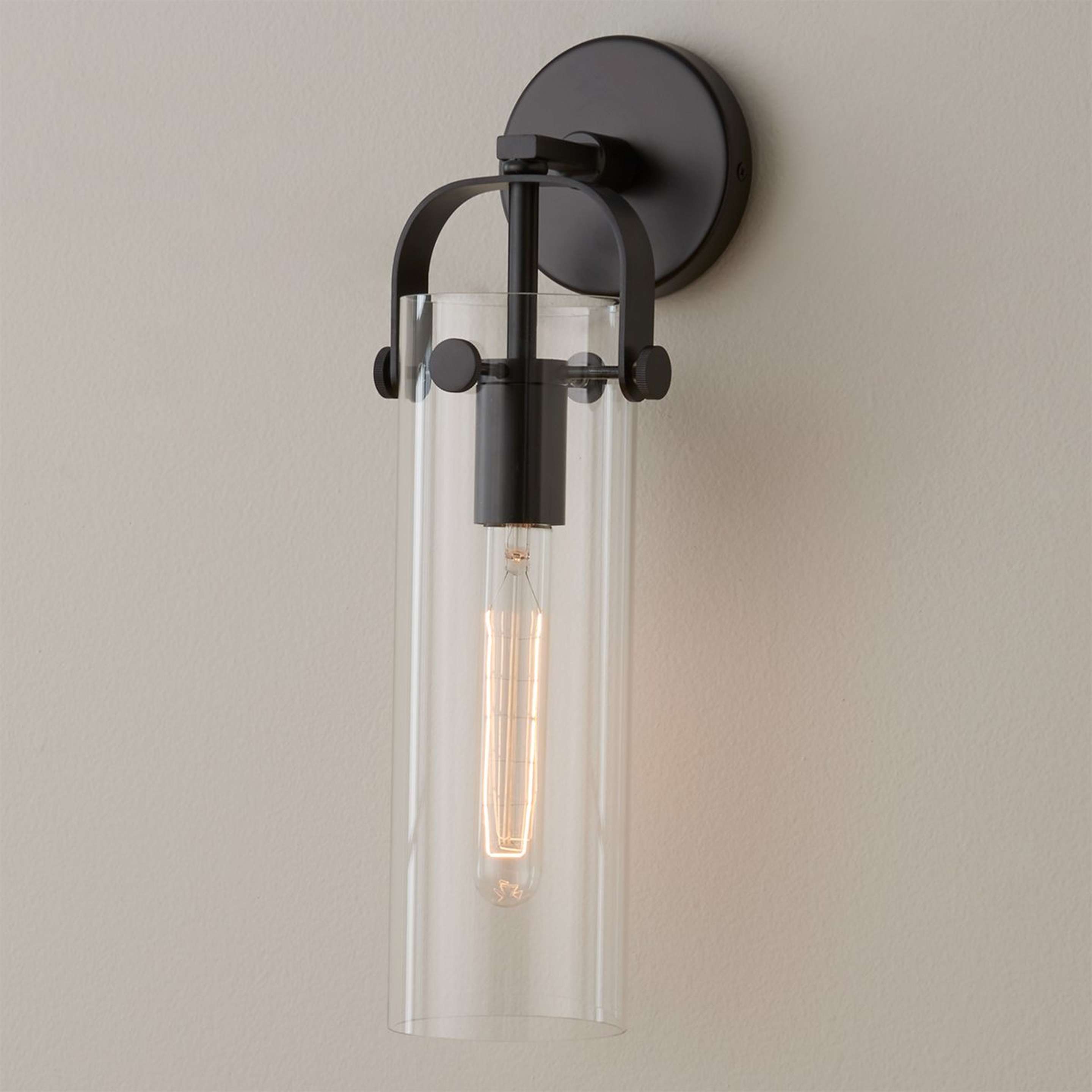 A Cylinder Slim Sconce with Matte Black color